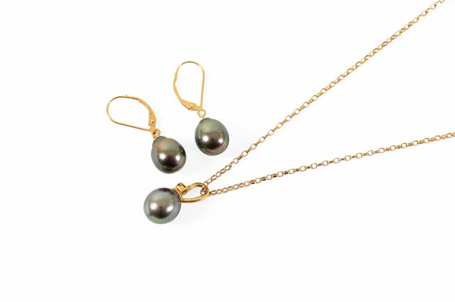 A Tahitian Pearl and Diamond Pendant on Chain, A Pair of Tahitian
