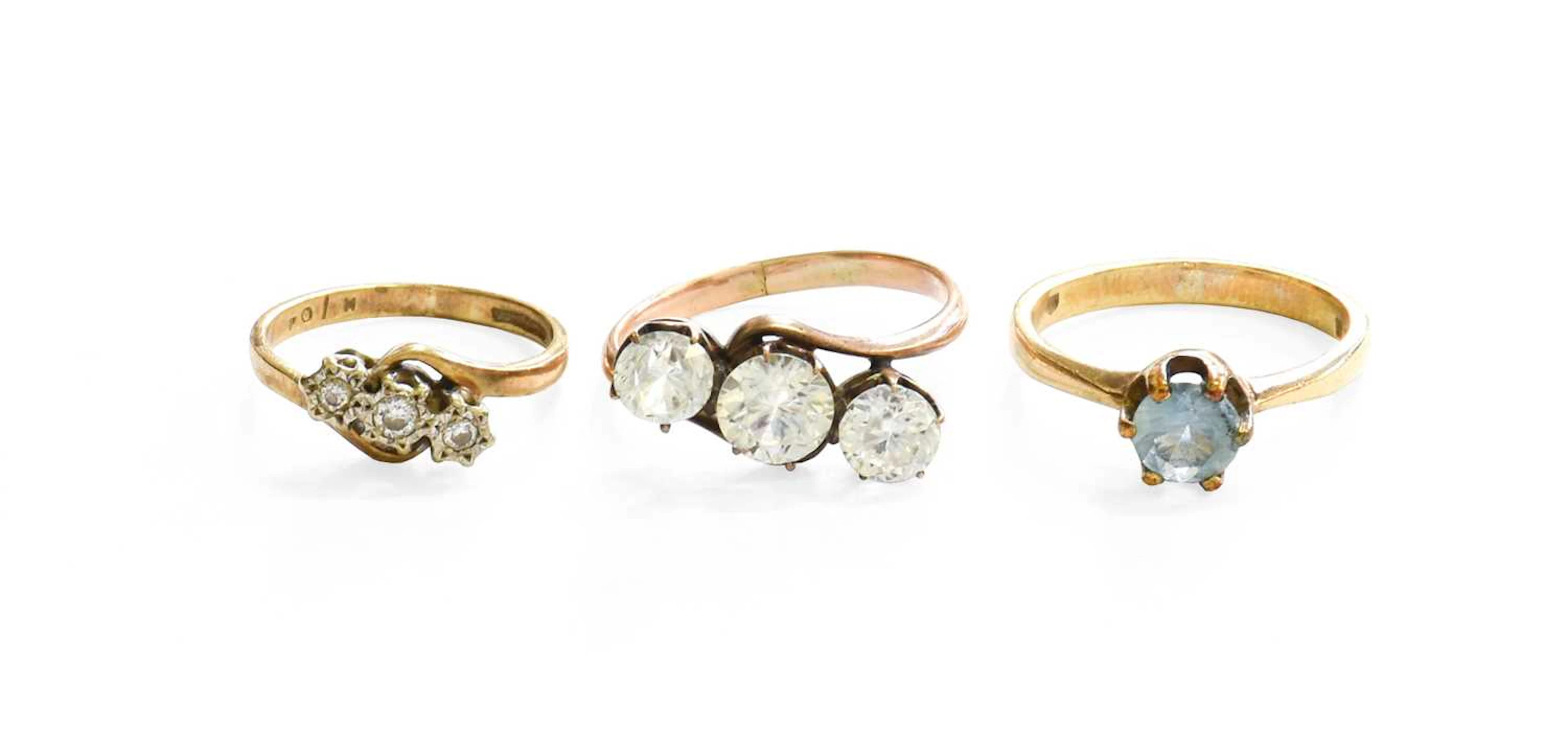 A 9 Carat Gold Diamond Three Stone Ring, A 9 Carat Gold Aquamarine