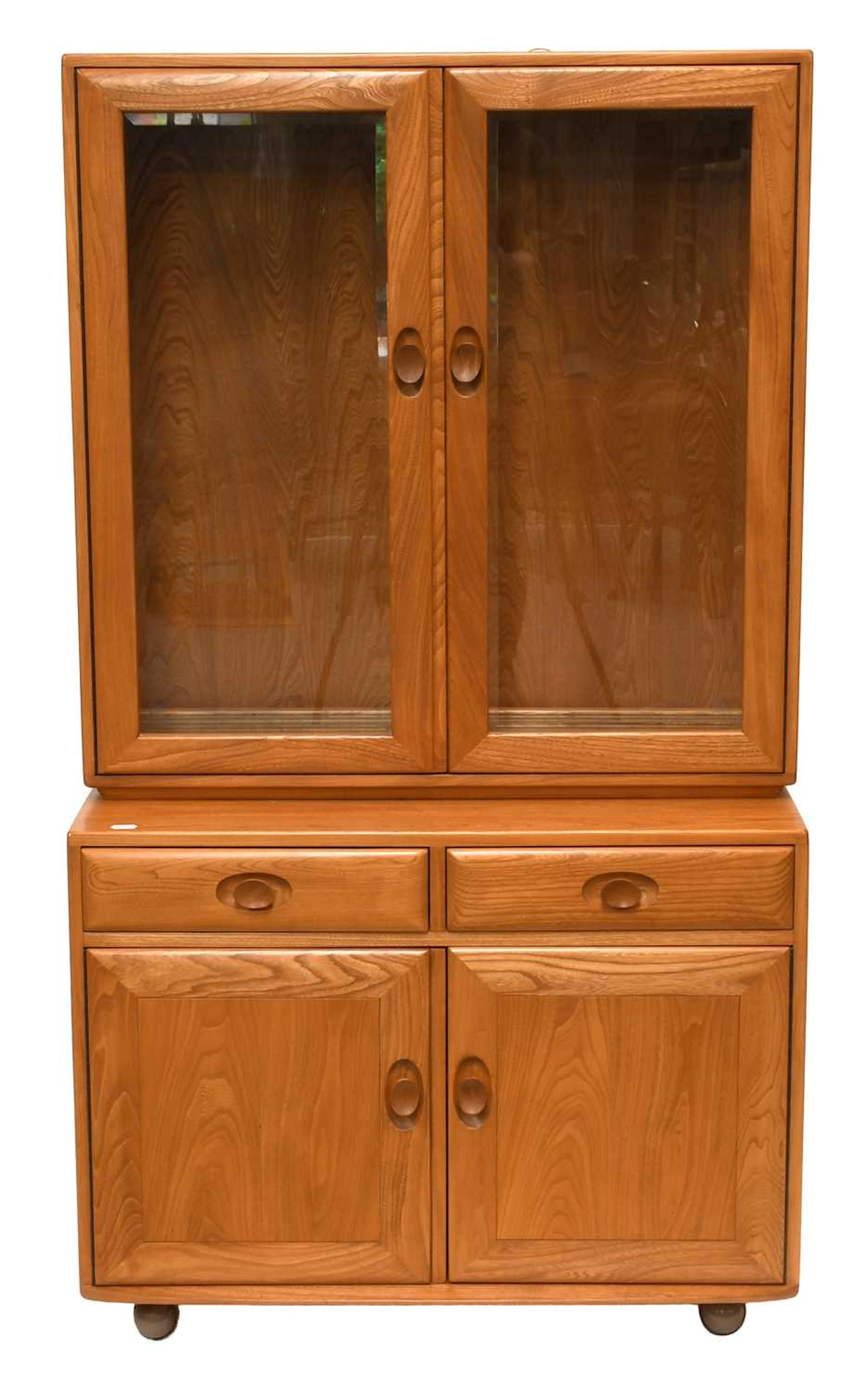 An Ercol Light Elm Display Cabinet