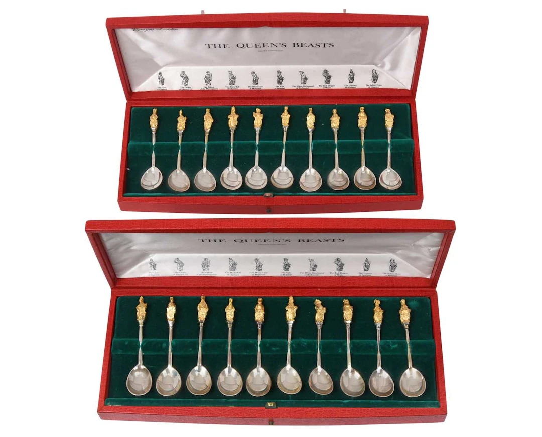 Two Cased Sets of Ten Elizabeth II Parcel-Gilt Silver Spoons, by William