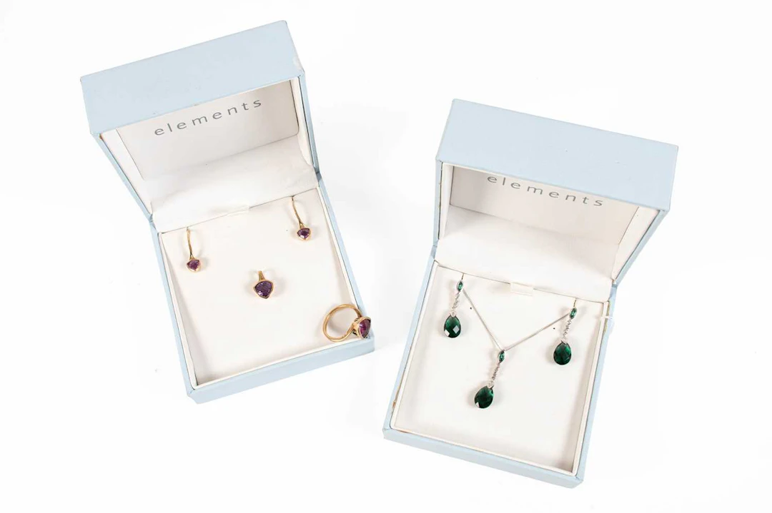 A Synthetic Purple Stone Ring, Earrings and Pendant Suite, by Elements