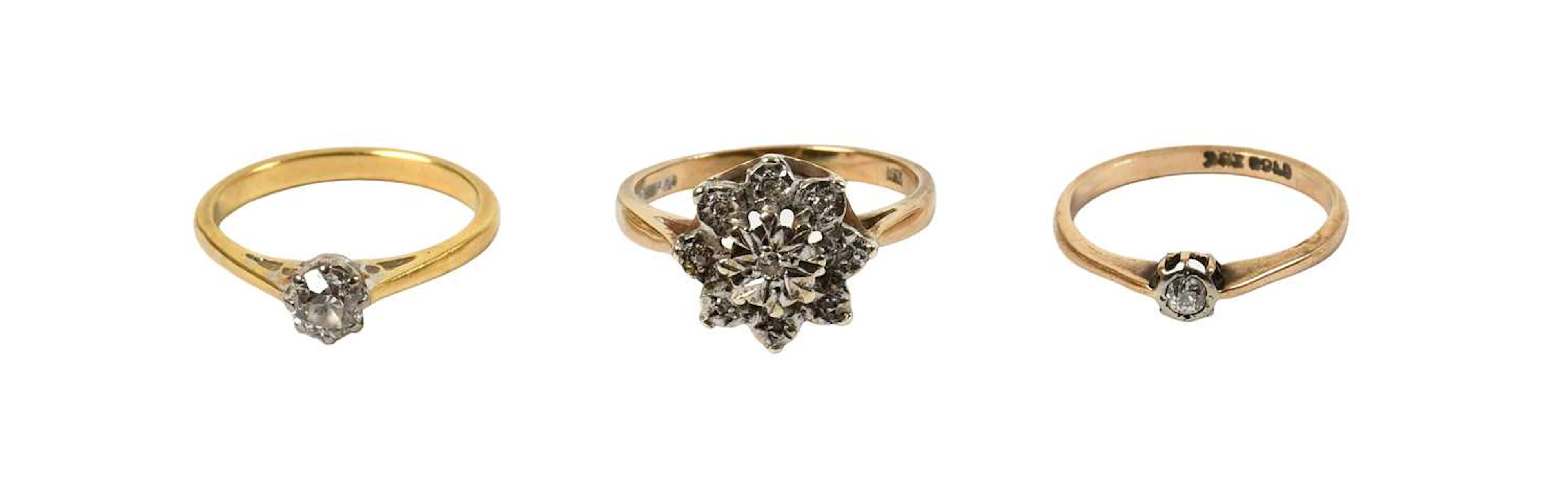 A 9 Carat Gold Diamond Cluster Ring, A Diamond Solitaire Ring, Another