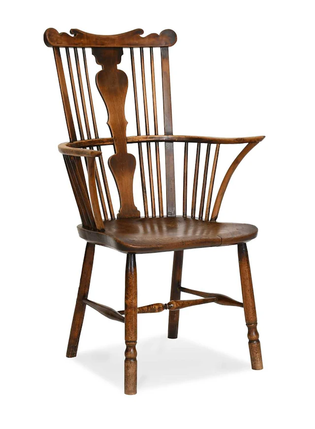 A George III Fruitwood and Elm Comb-Back Windsor Armchair