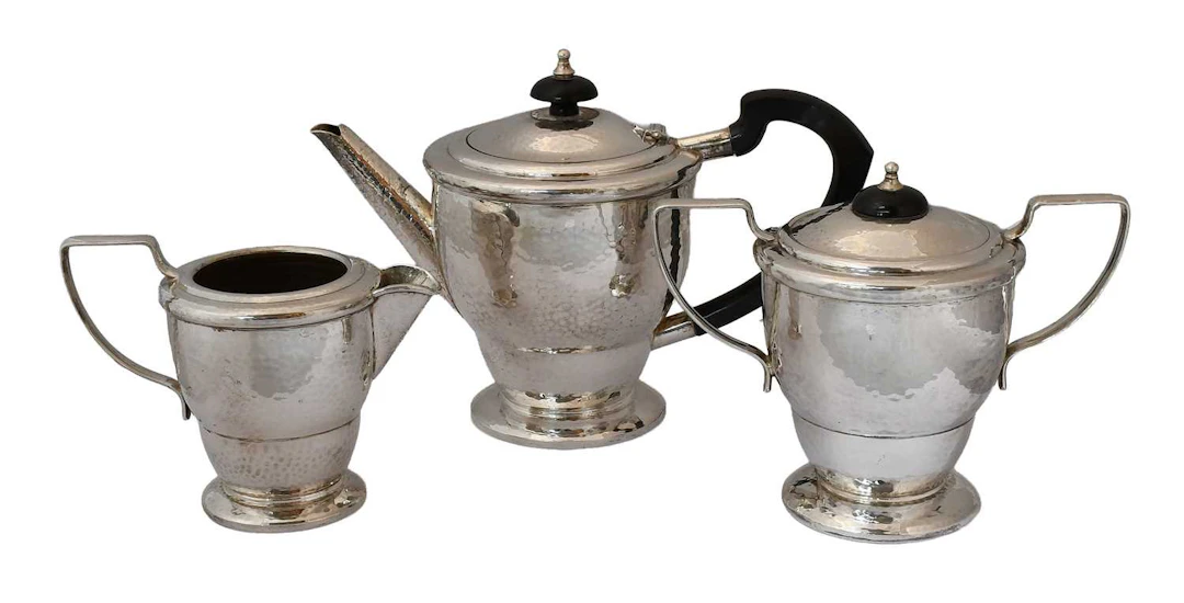A Three-Piece George VI Silver Tea-Service, by Birmingham Plate and