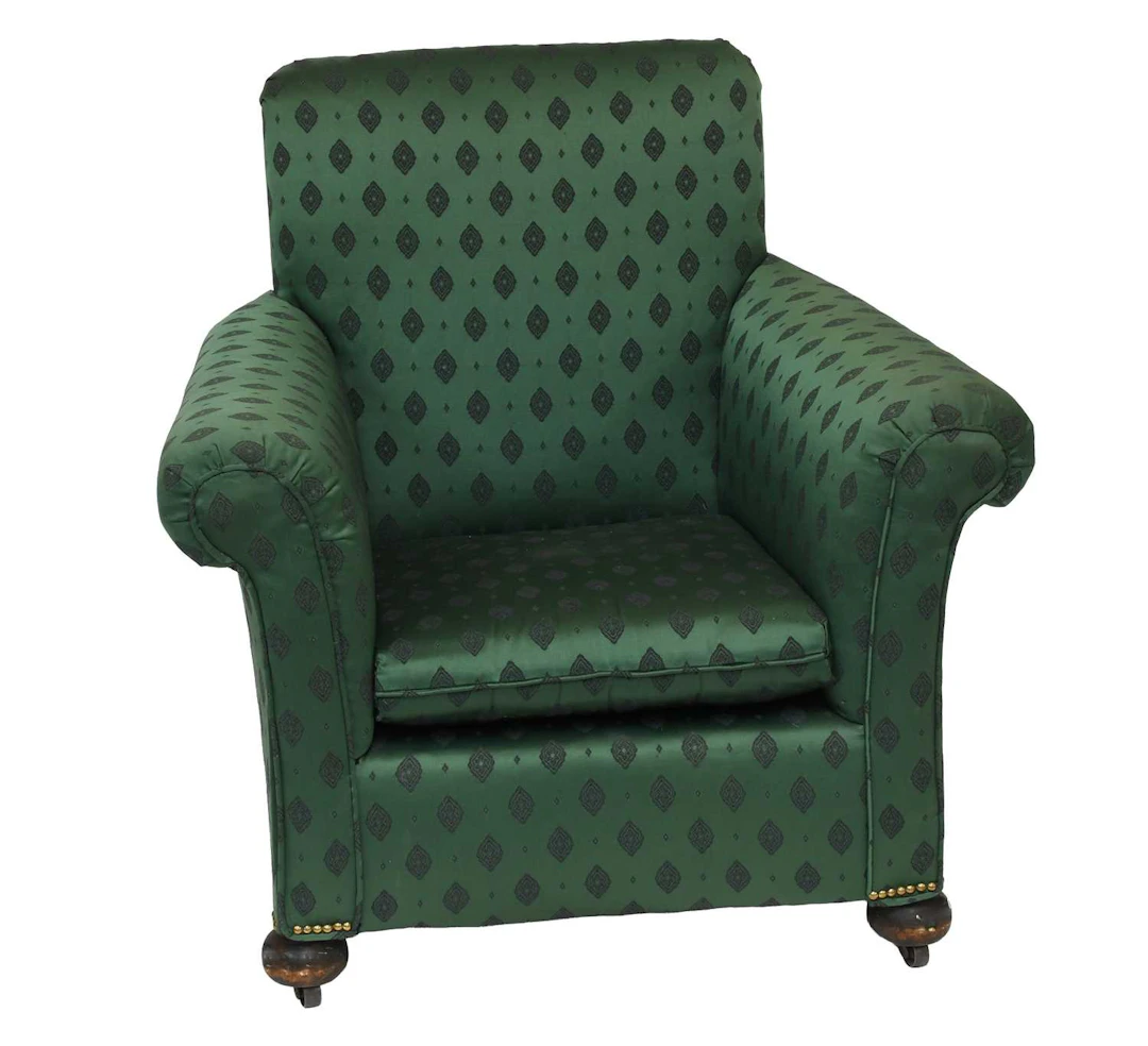 A Green Upholstered Armchair