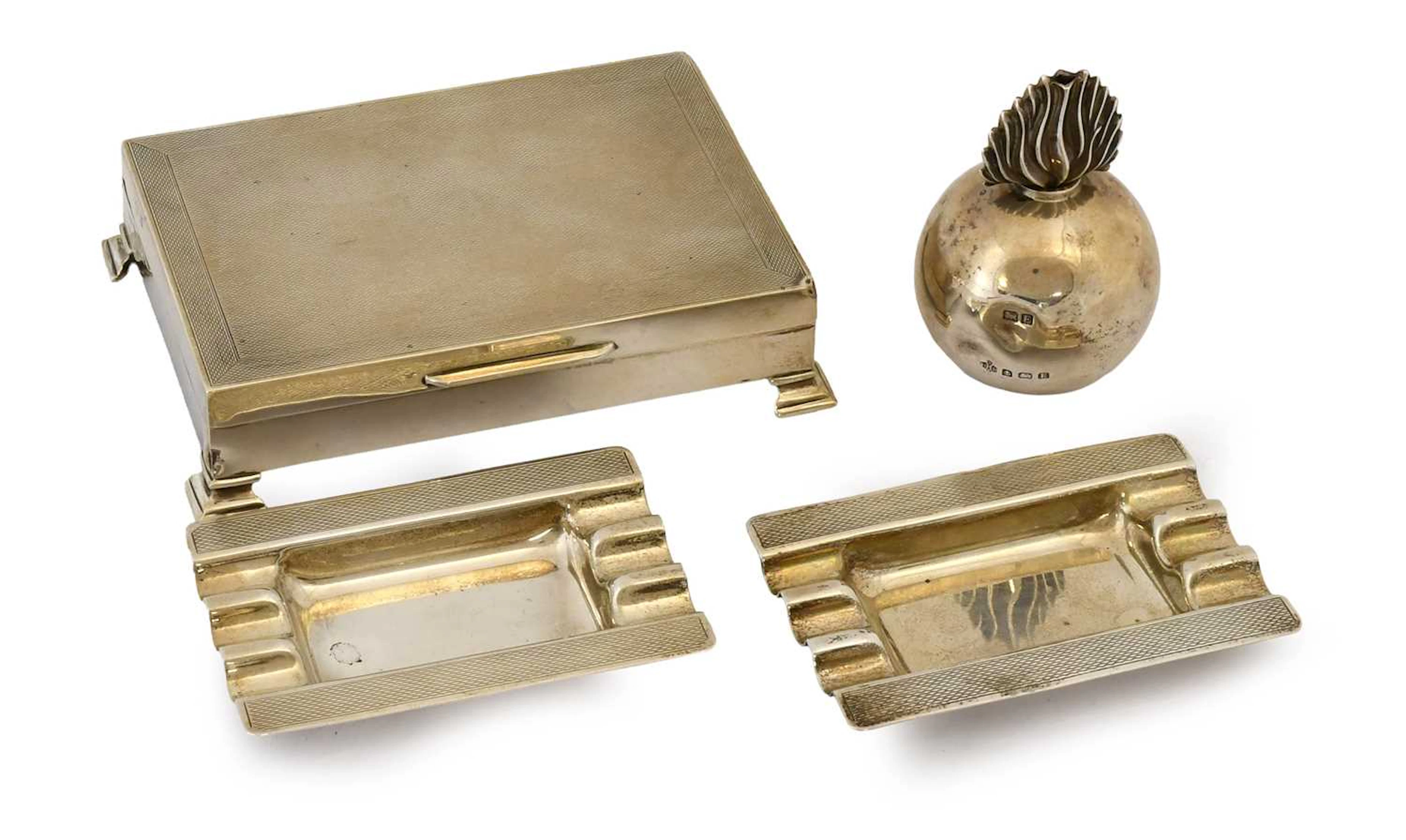 A Collection of Assorted Silver Smoking Accessories