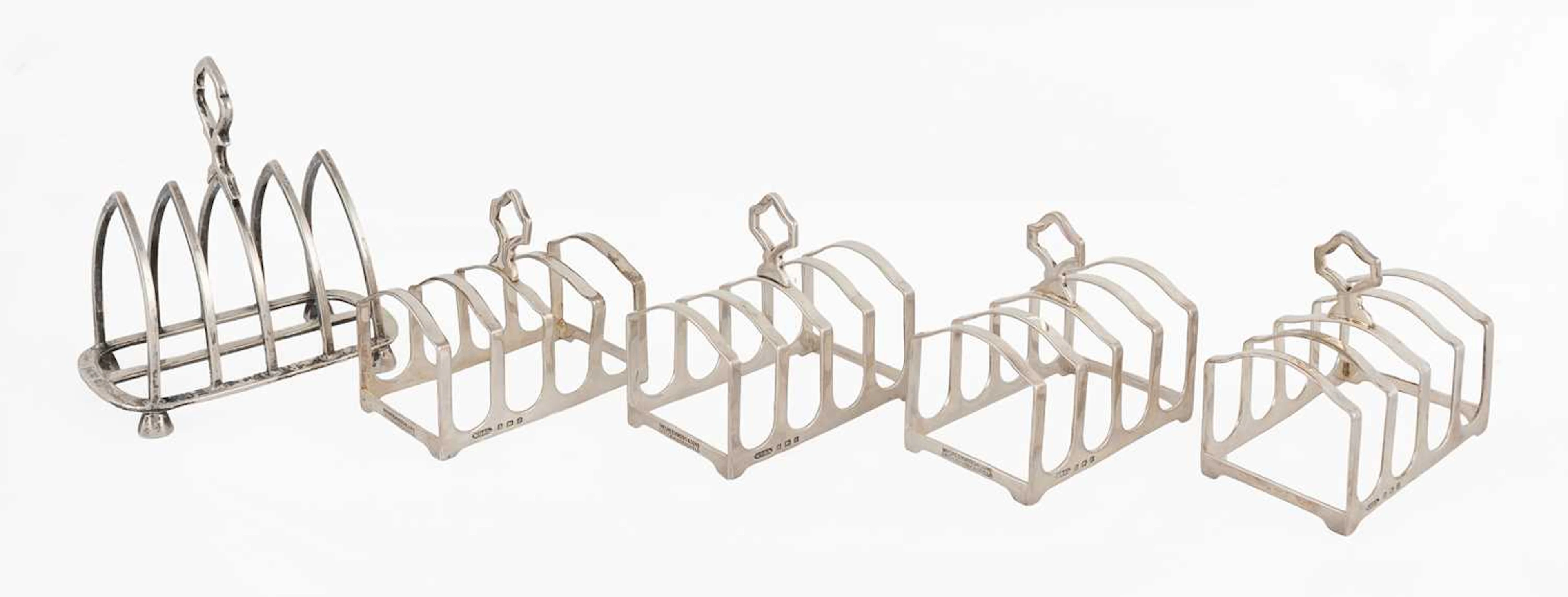 A Set of Four George V Silver Toast-Racks, by William Griffiths and