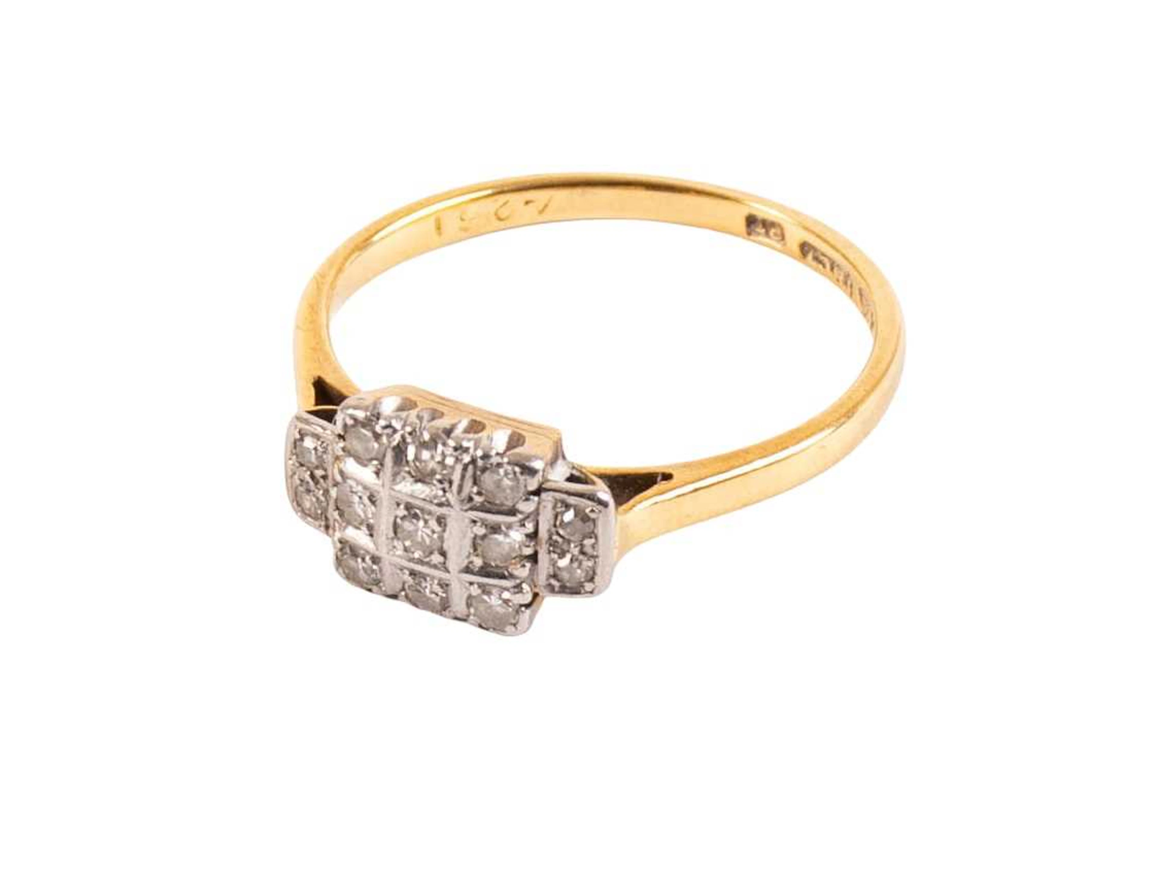 A Diamond Cluster Ring