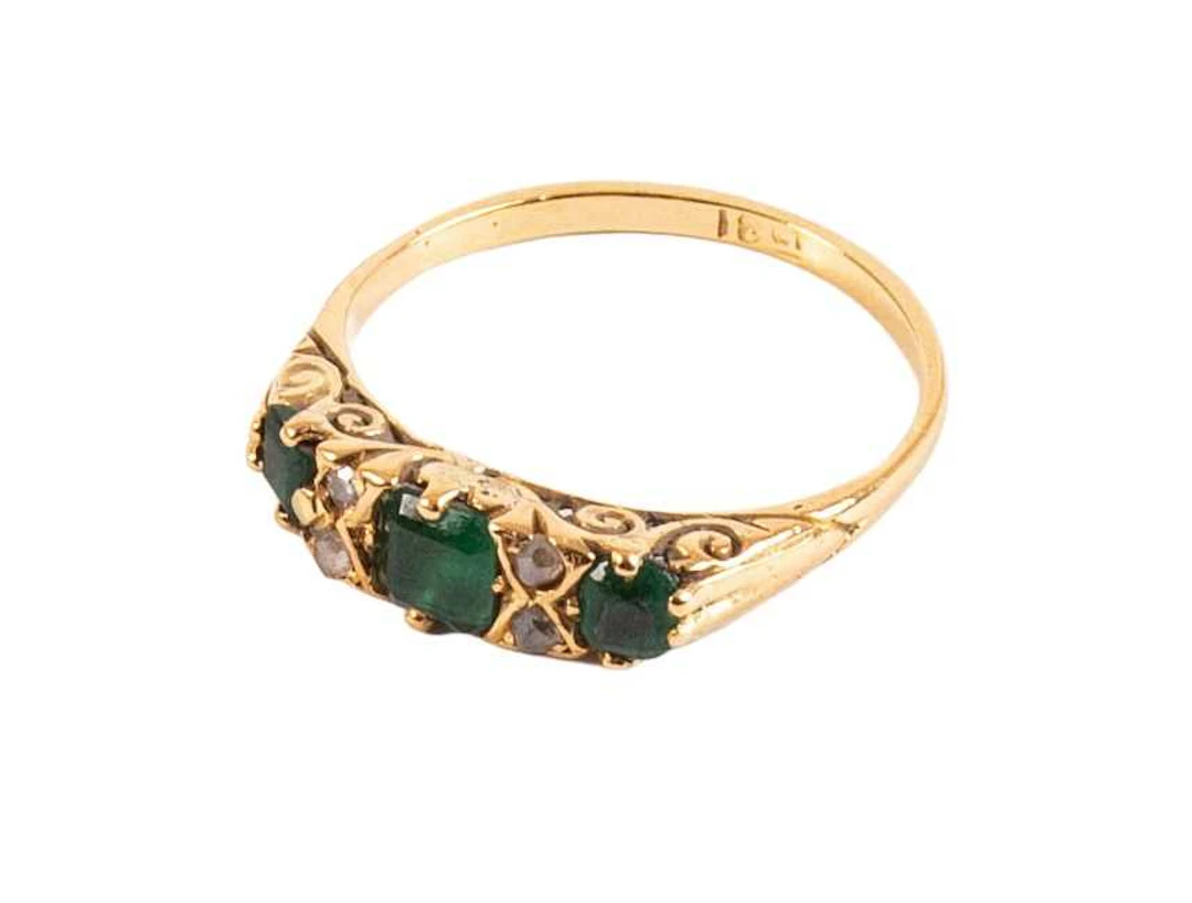 An Emerald and Diamond Ring