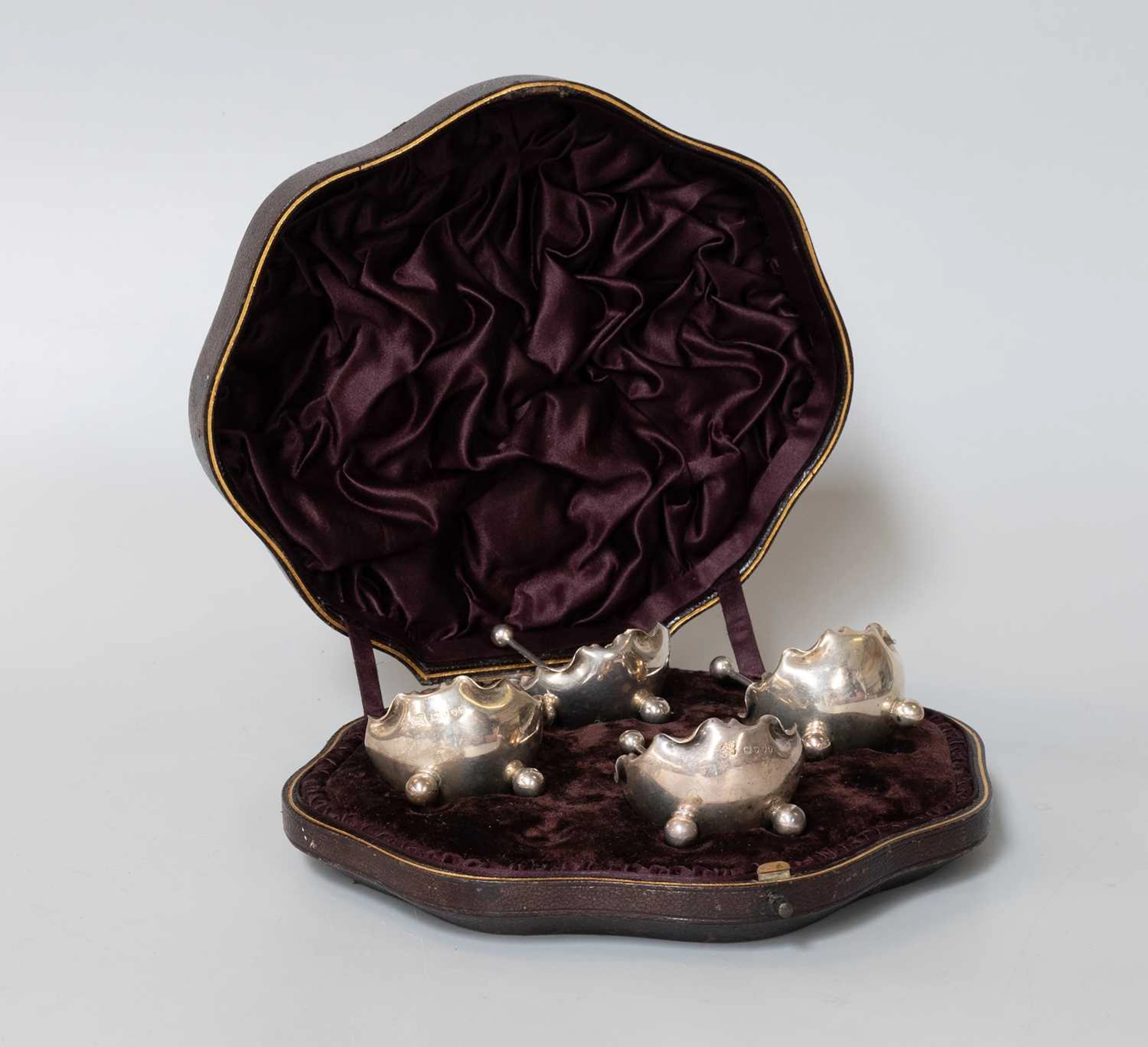 A Cased Set of Four Victorian Silver Salt-Cellars and Spoons, by