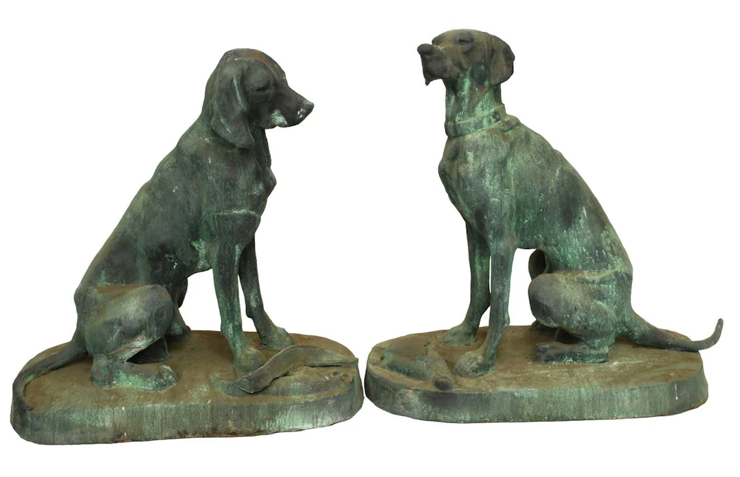 Two Weathered Garden Statues of Seated Hounds