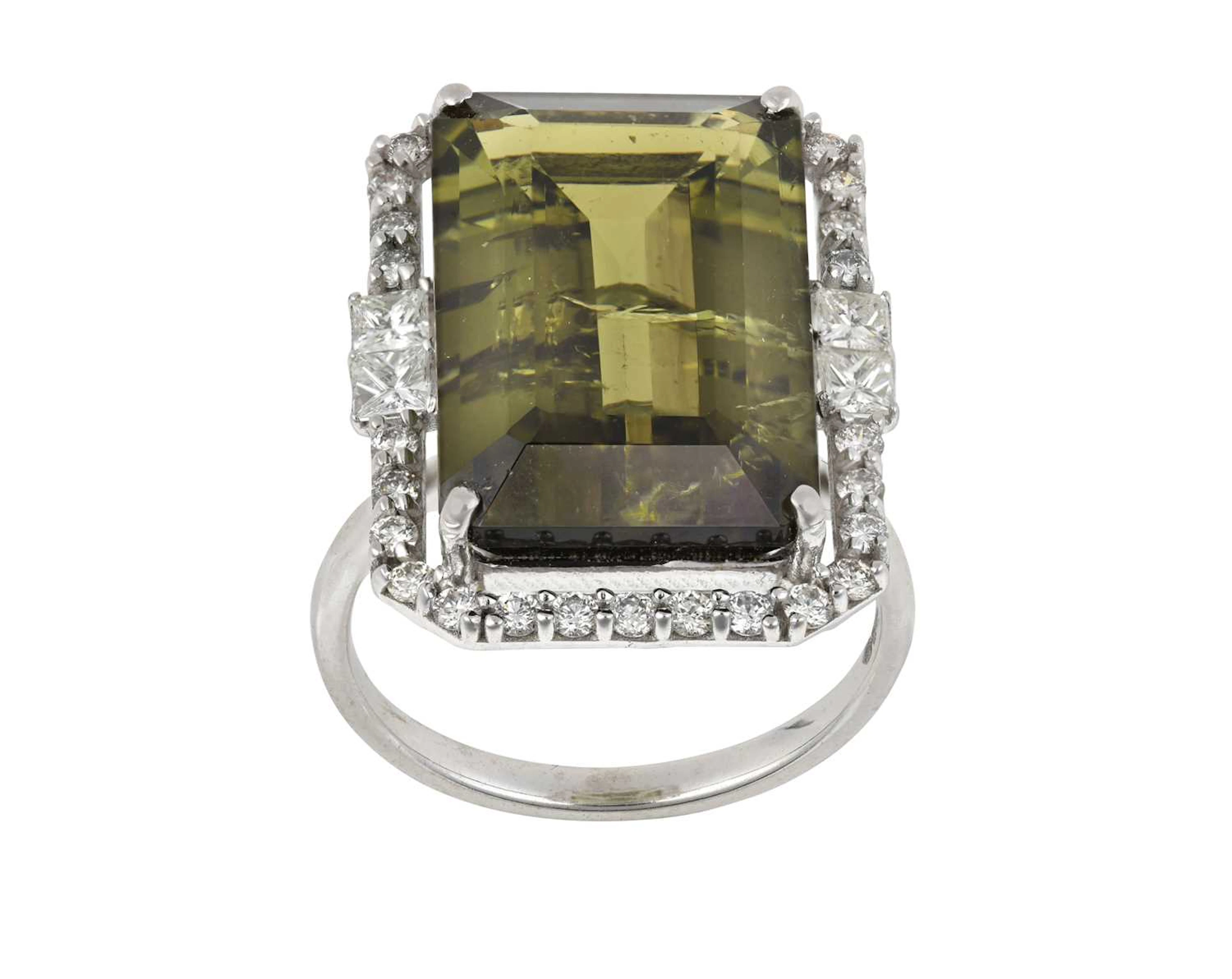 A 14 Carat White Gold Green Tourmaline and Diamond Cluster Ring