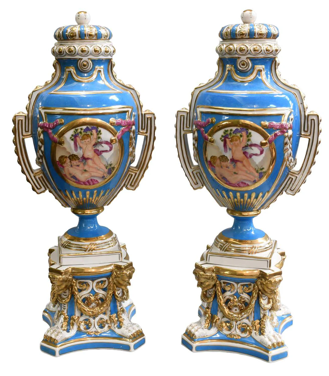 A Pair of Sèvres Style Porcelain Urns, Covers, and Stands, 20th century