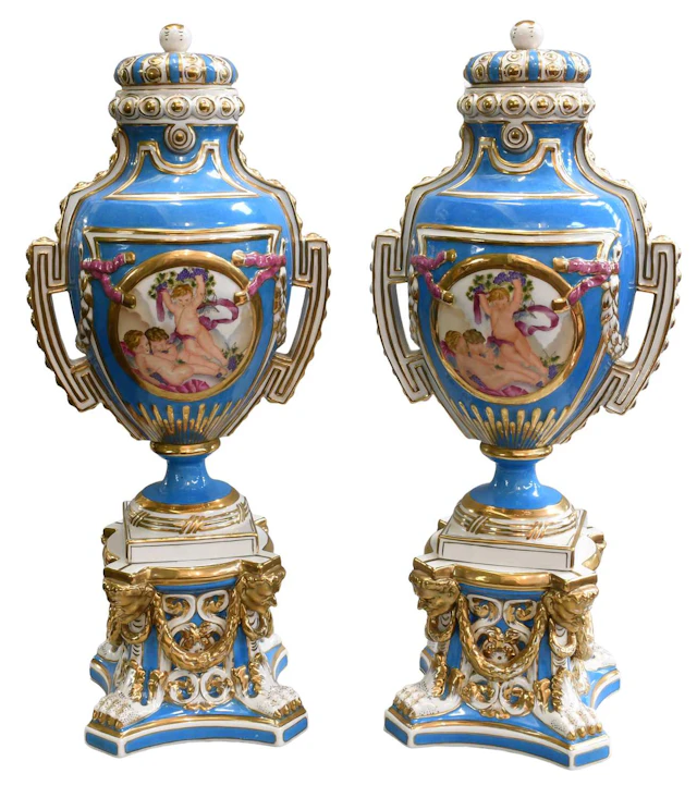 A Pair of Sèvres Style Porcelain Urns, Covers, and Stands, 20th century