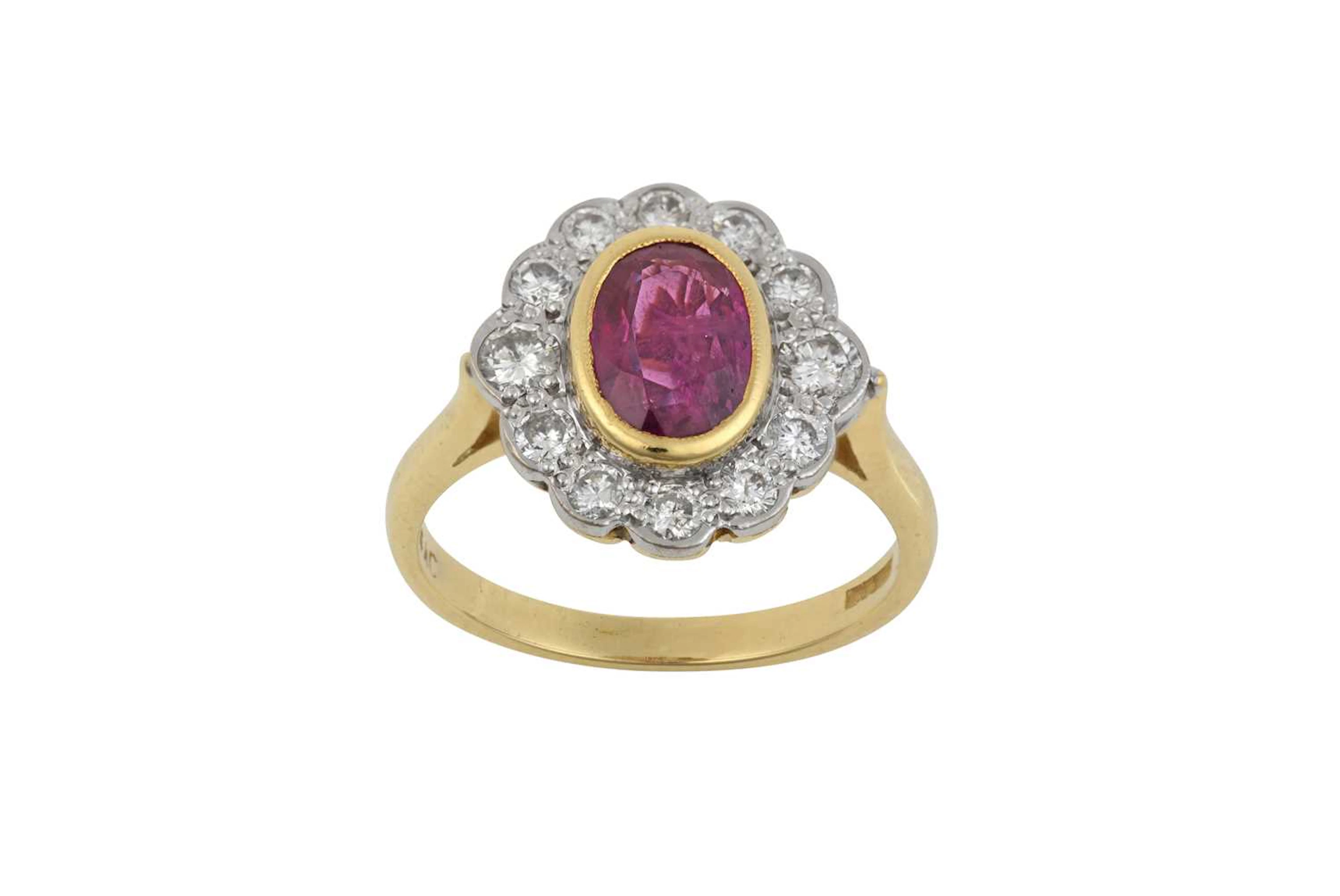 An 18 Carat Gold Ruby and Diamond Cluster Ring