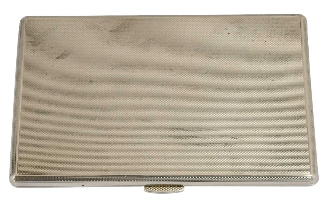 An Elizabeth II Silver Cigarette-Case, by Garrard and Co Ltd., Birmingham