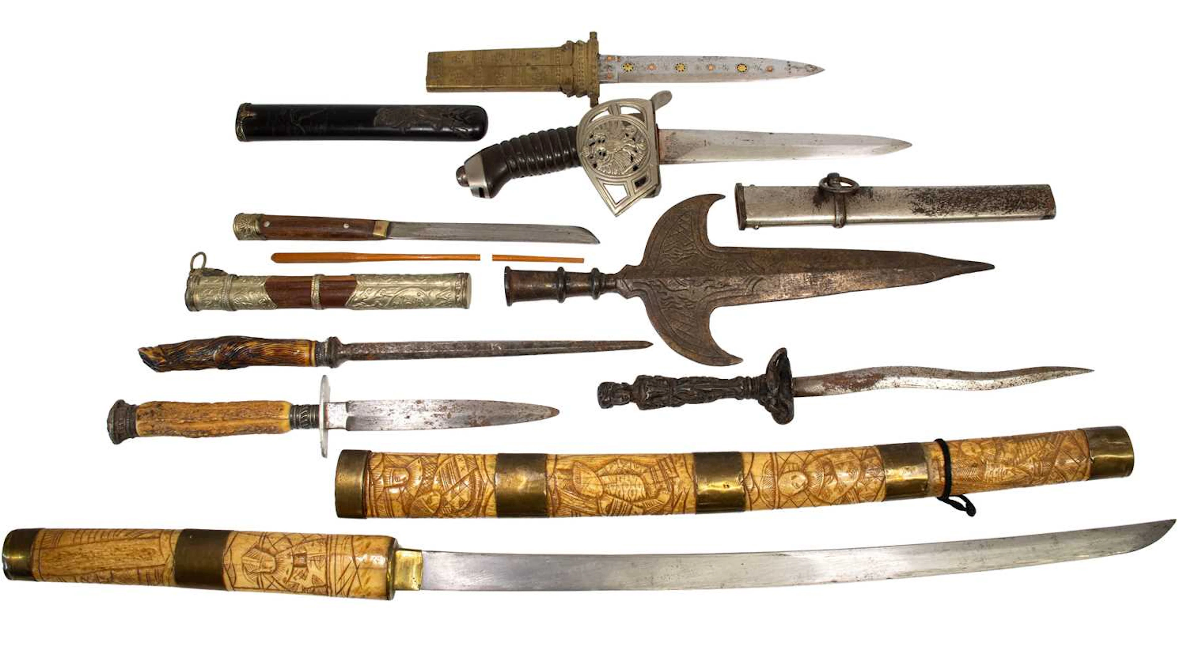 A Prussian M1889 Cavalry Sword, a Japanese Katana, a Chinese Eating Set, also