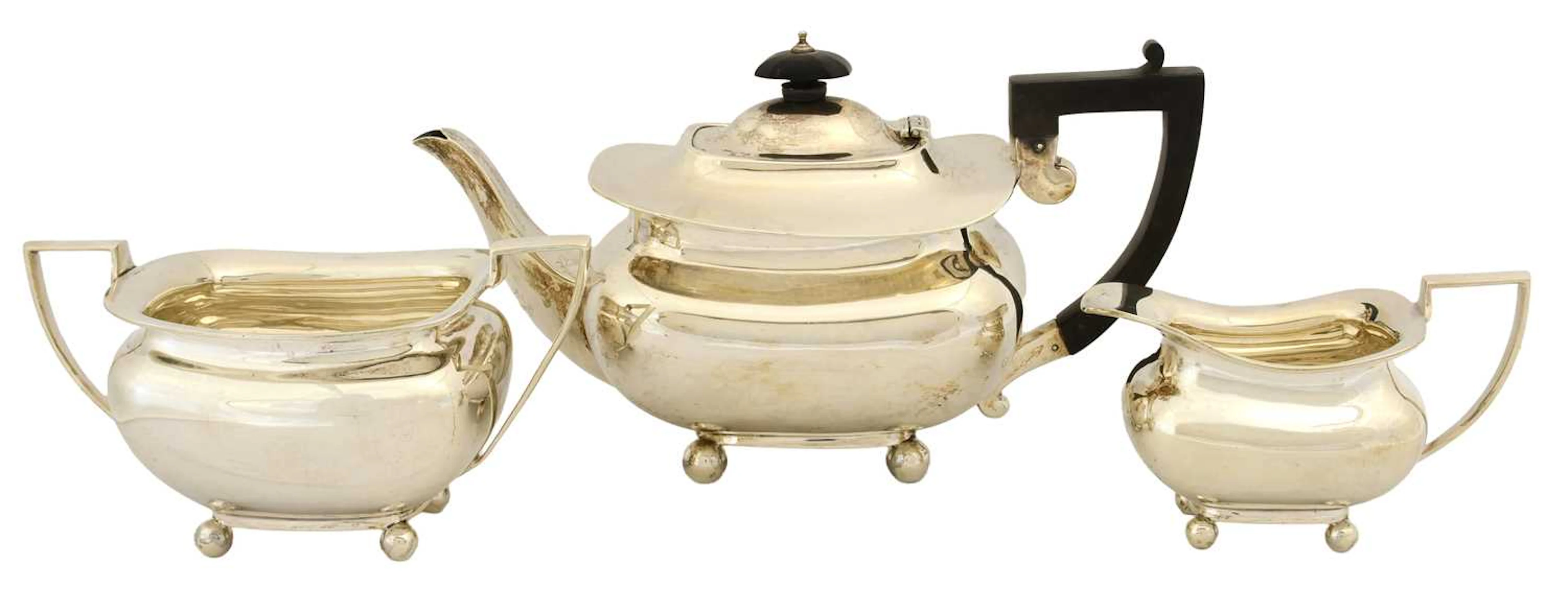 A Three-Piece George V Silver Tea-Service, by C. W. Fletcher and Son