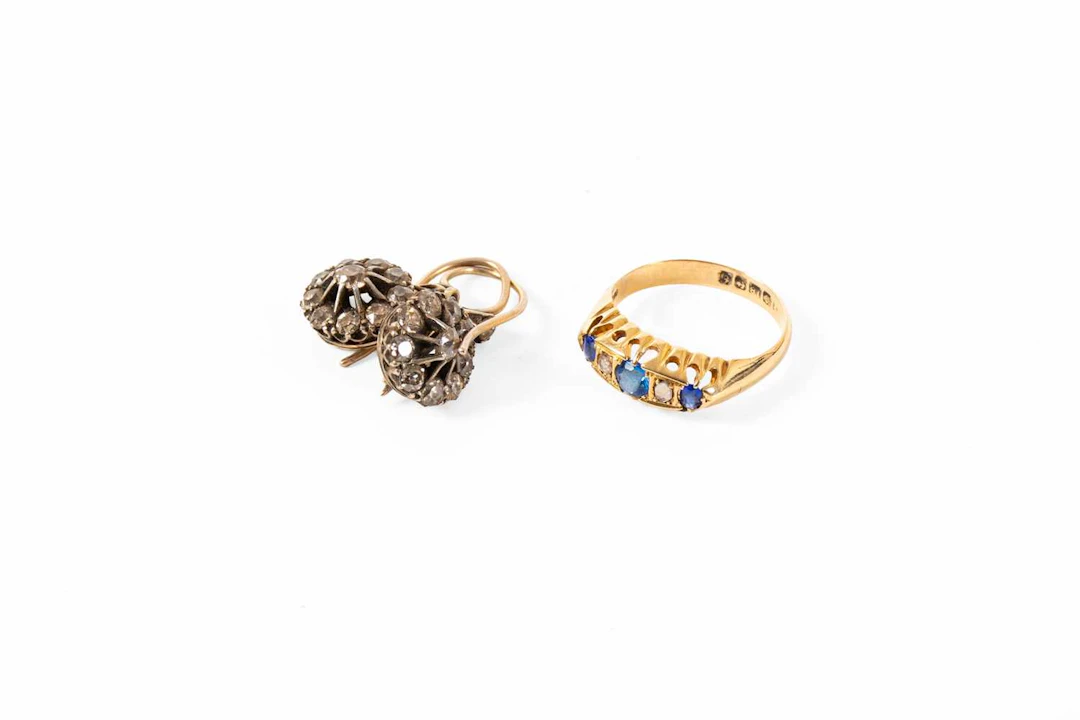 A Pair Of Diamond Earrings, An 18 Carat Gold and Blue Paste Ring