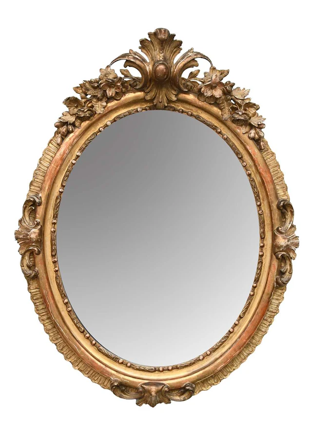 A Mid 19th Century Carved Giltwood and Composition Oval Wall Mirror