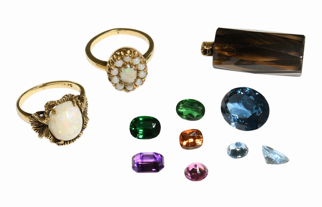 An Opal Ring, An Opal Cluster Ring, A Quantity of Loose Stones