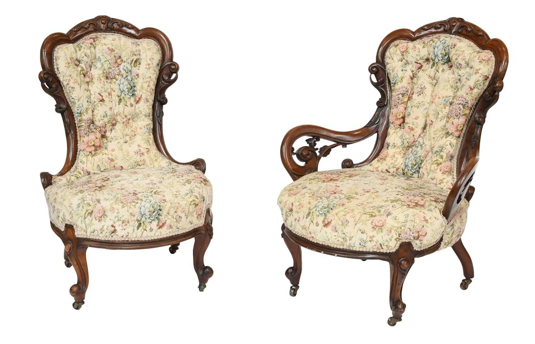 A Pair of Victorian Carved Mahogany Fireside Chairs