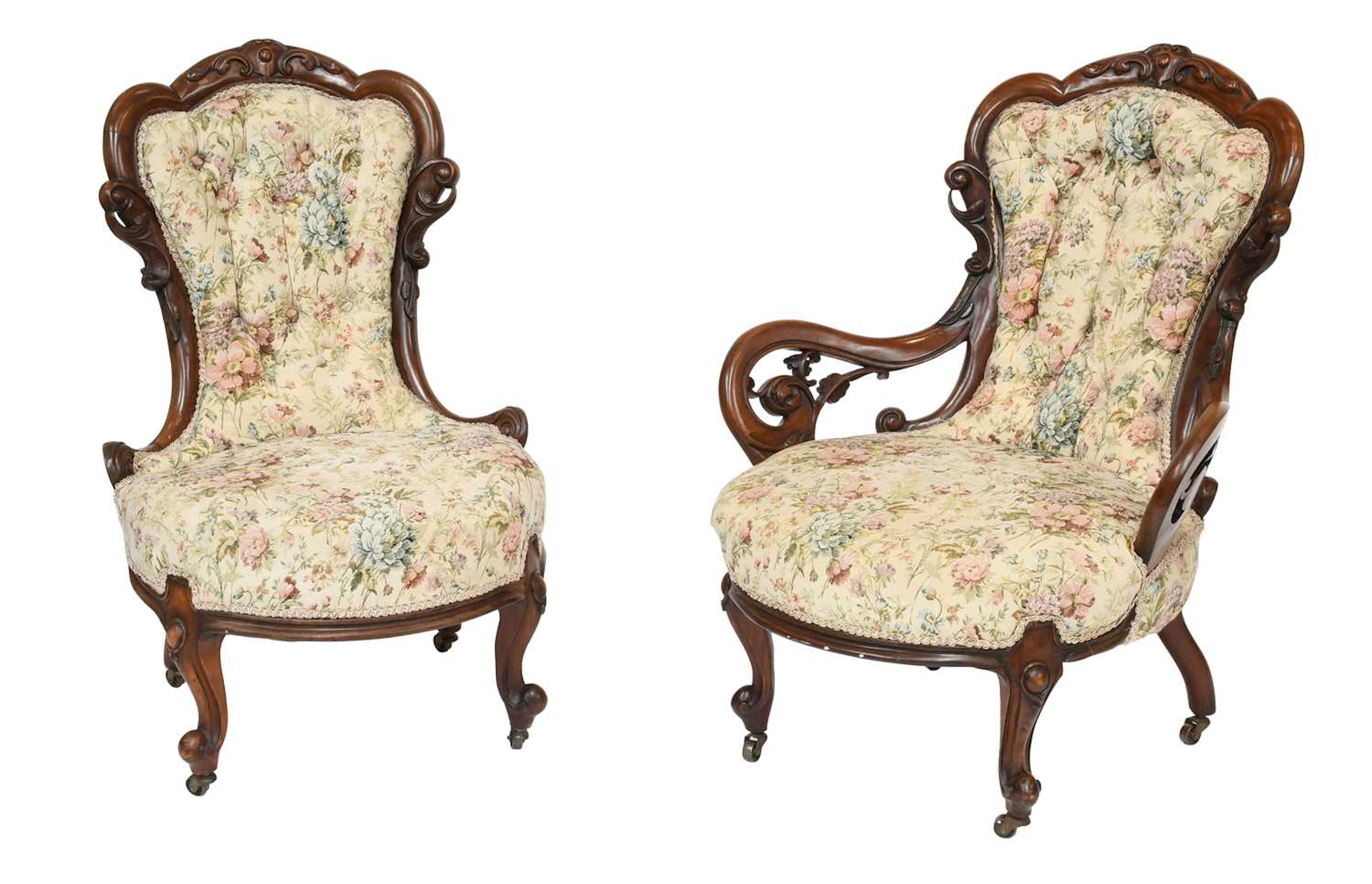A Pair of Victorian Carved Mahogany Fireside Chairs