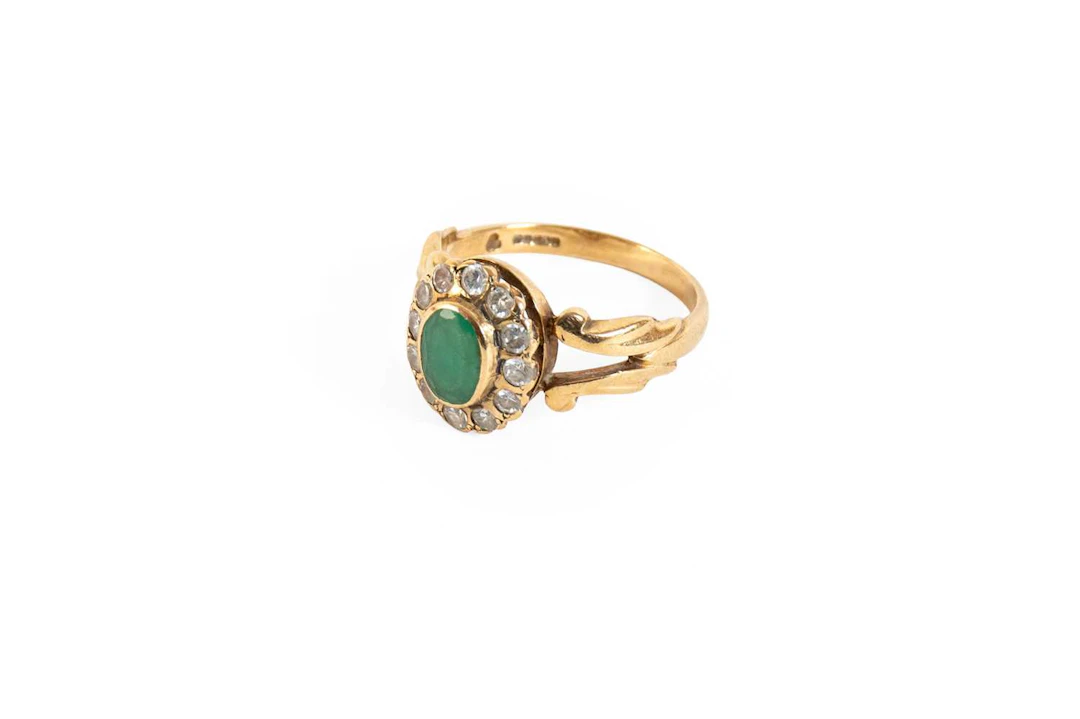 A 9 Carat Gold Green Stone Cluster Ring
