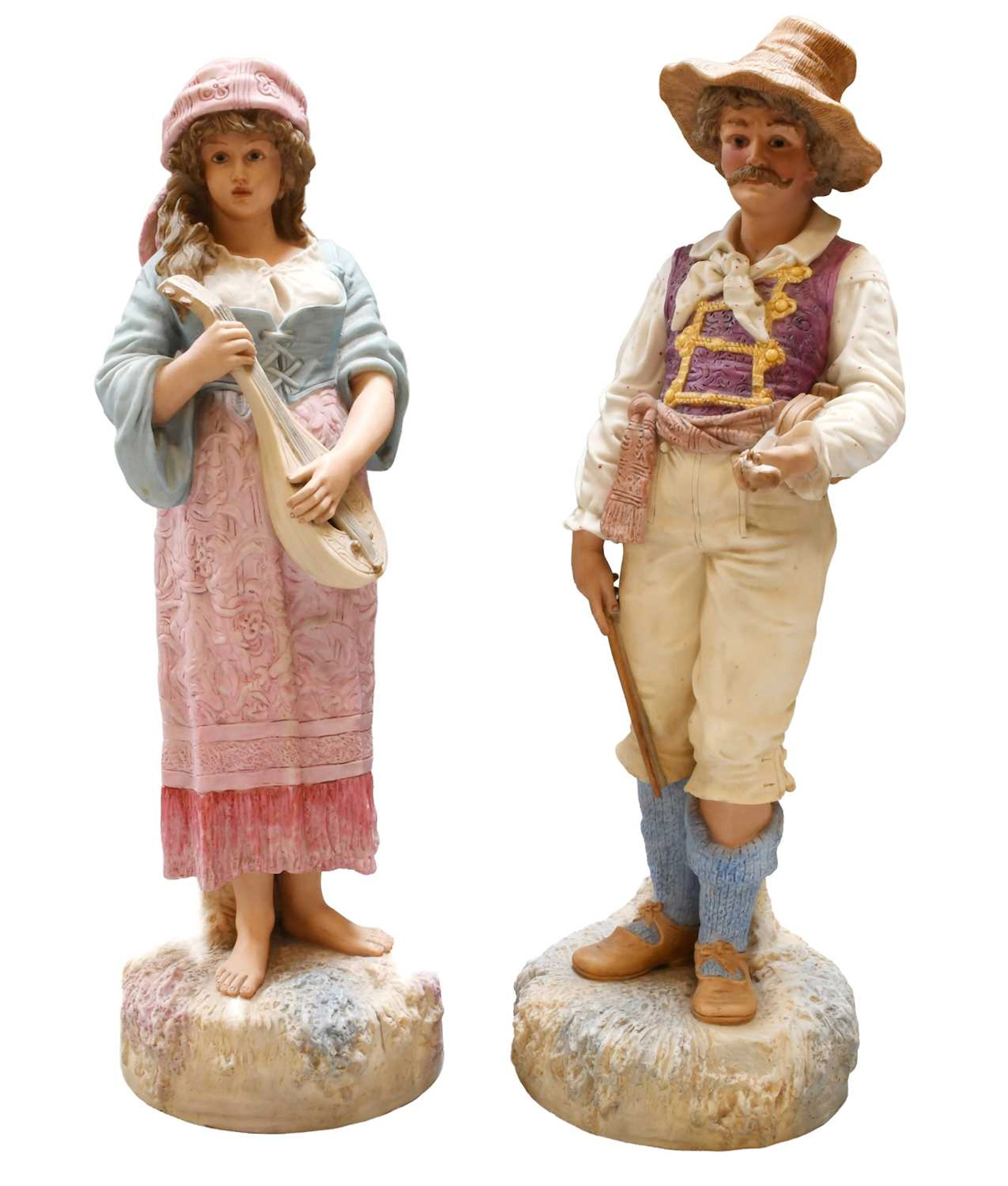 A Pair of Robinson & Leadbeater Bisque Porcelain Figures of Romany Musicians