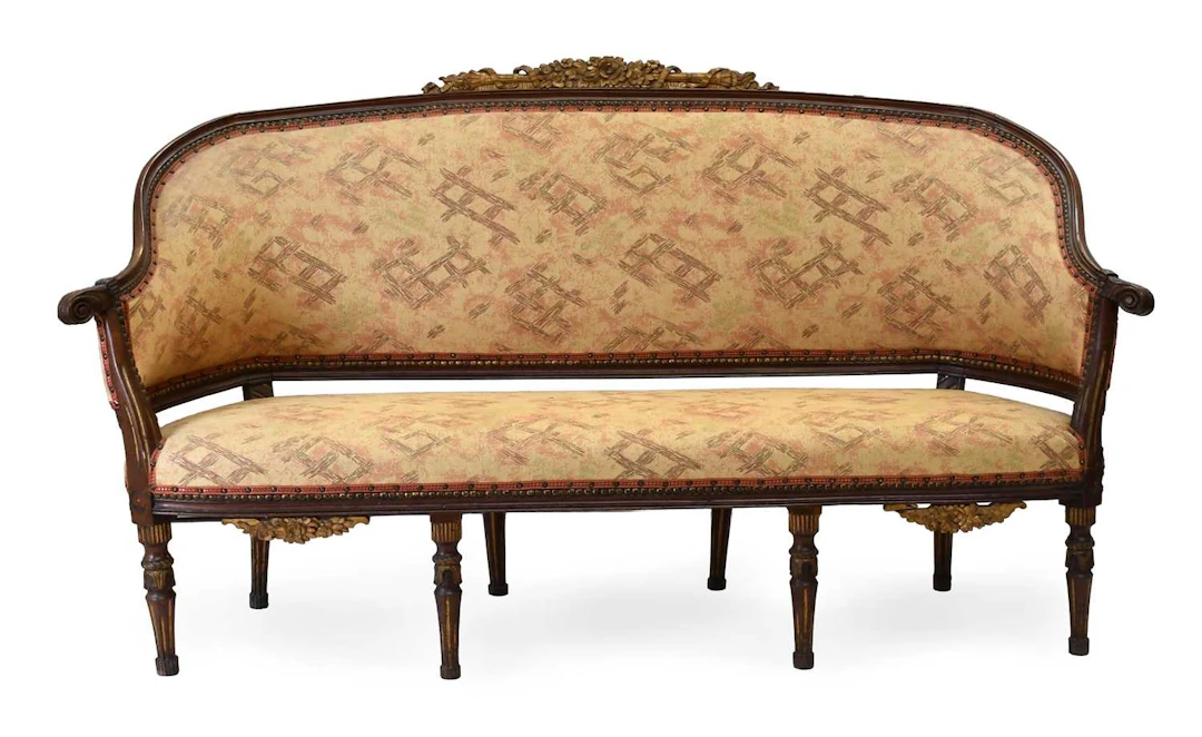 A French Louis XV-Style Carved Walnut Three-Seater Sofa