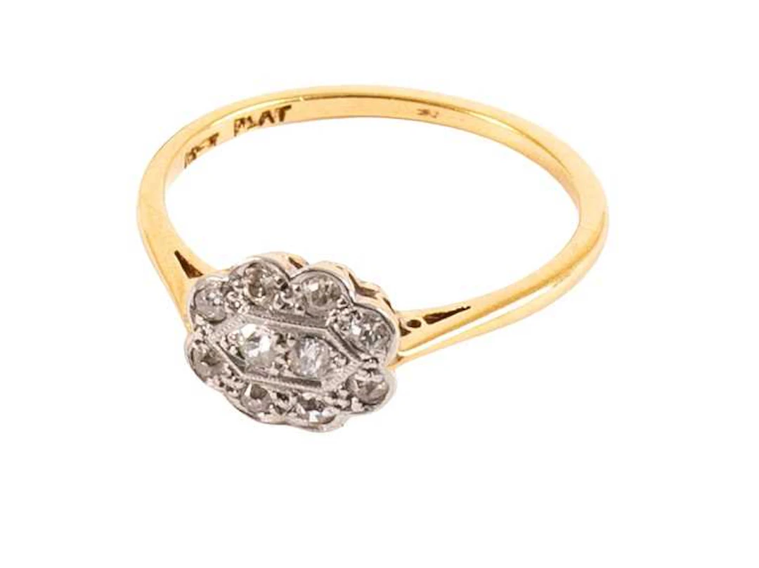A Diamond Cluster Ring