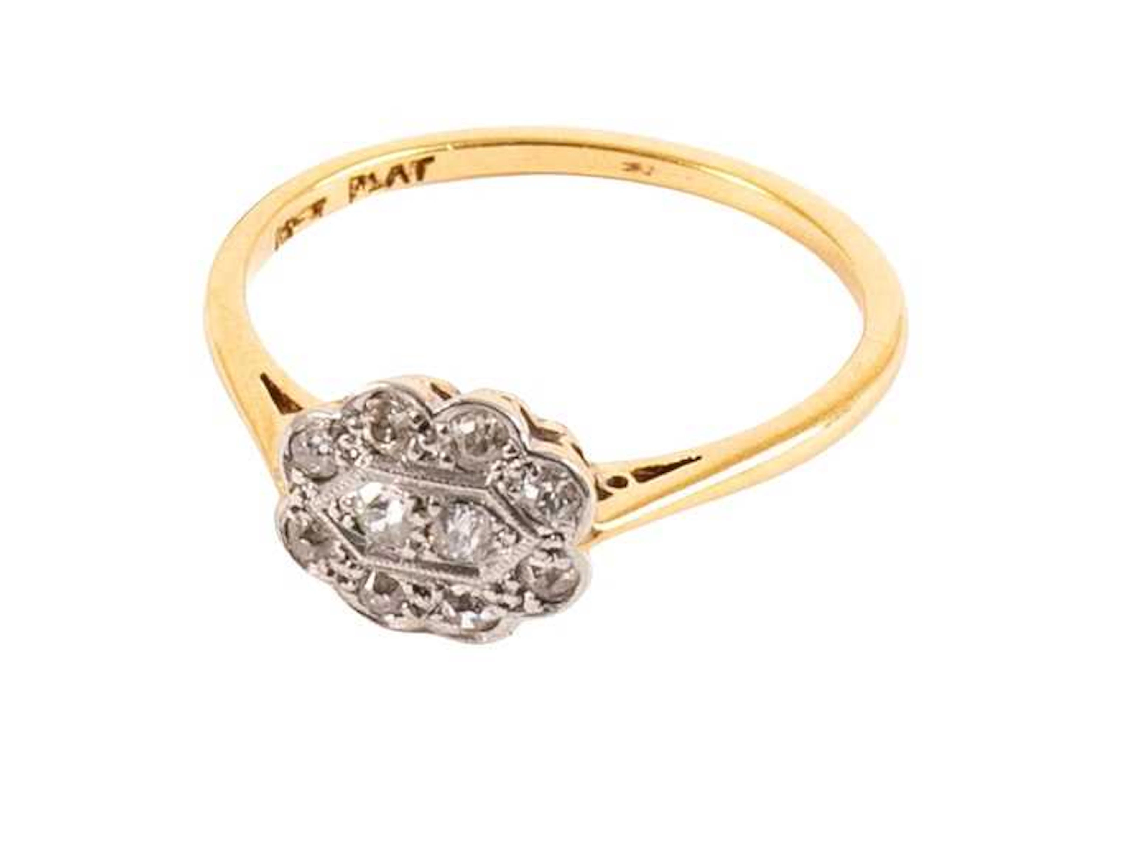 A Diamond Cluster Ring