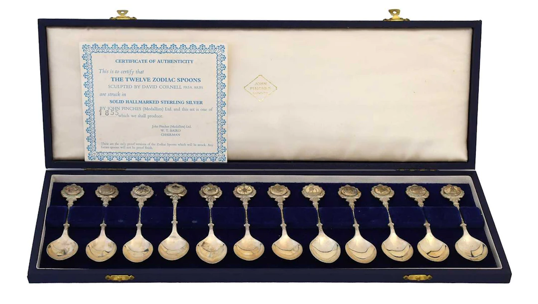 A Cased Set of Twelve Elizabeth II Silver Zodiac Spoons, by John Pinches