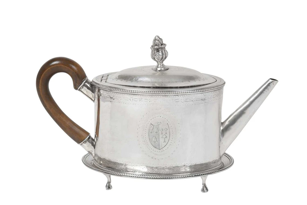 A George III Silver Teapot and a George III Silver Teapot-Stand The