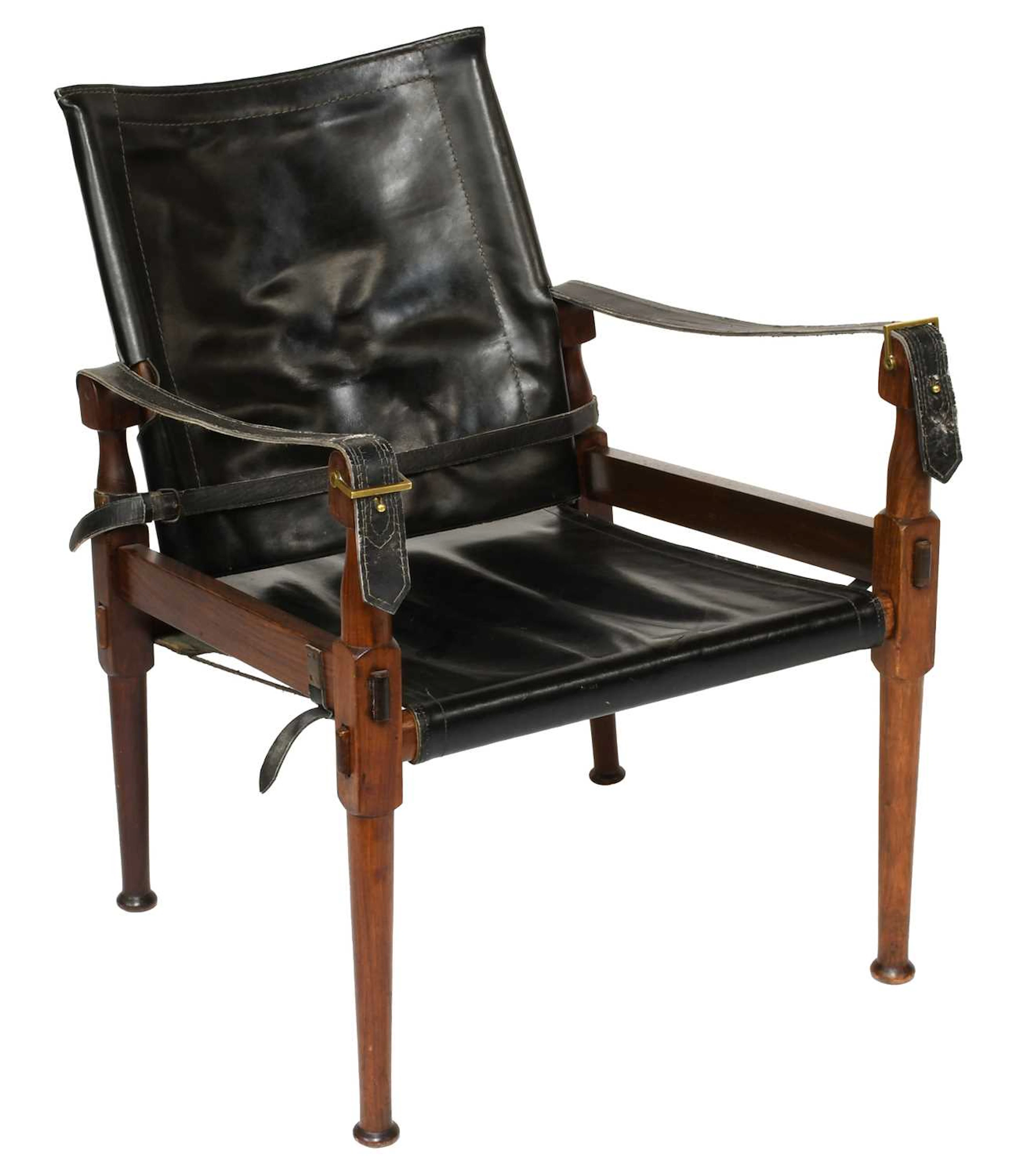 A Leather Safari Roorkee Campaign Armchair, probably by M.Hayat & Brothers