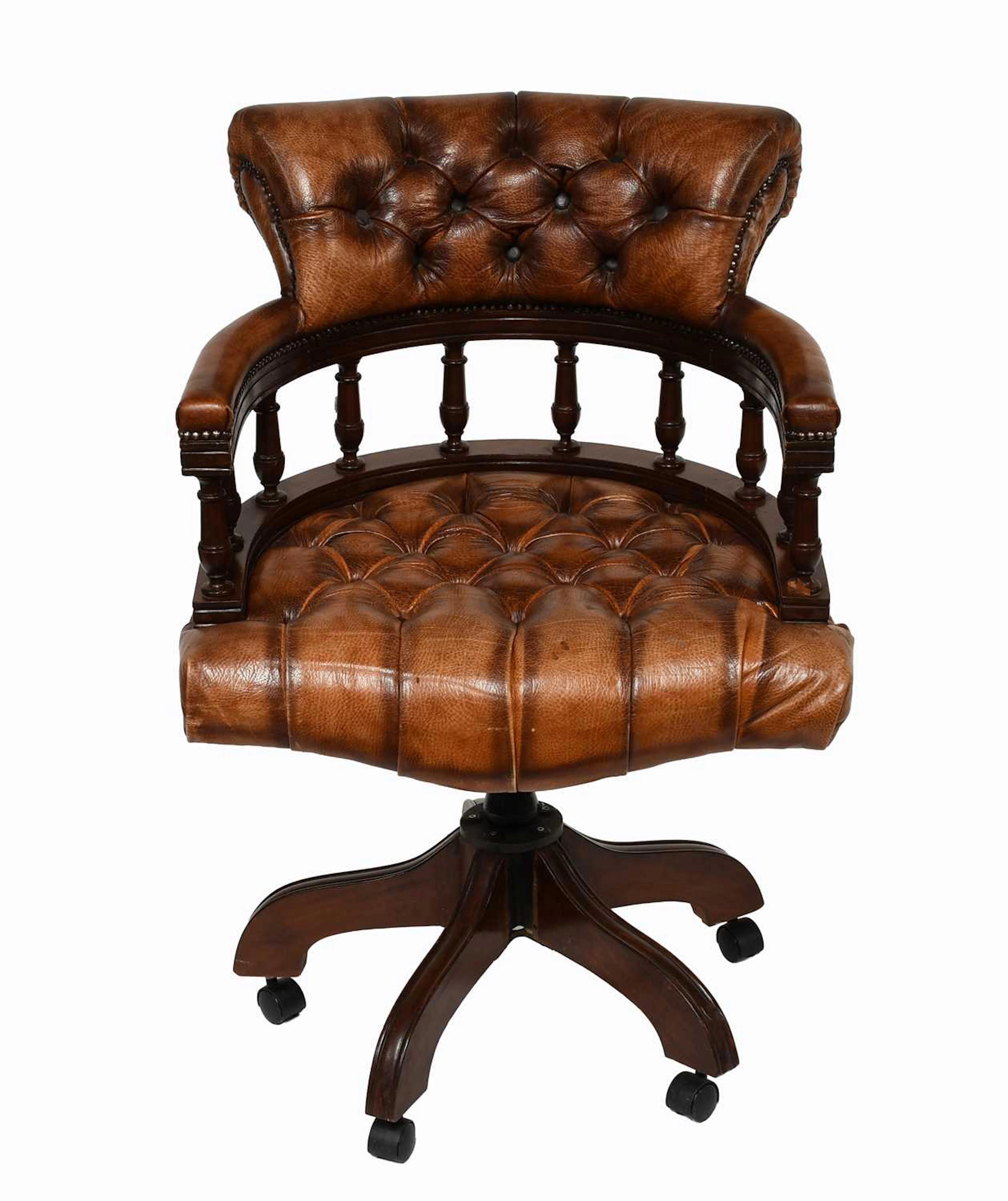A Buttoned Brown Leather Swivelling Office Chair