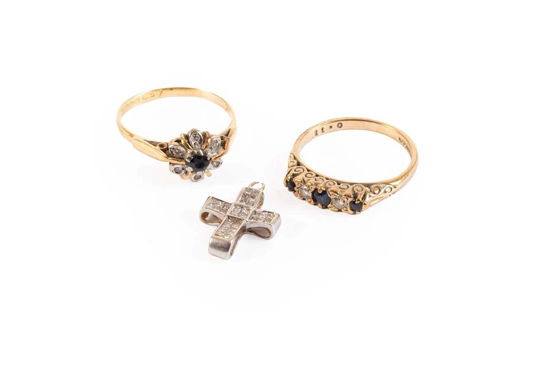 A 9 Carat Gold Sapphire and Diamond Five Stone Ring, An 18 Carat Gold