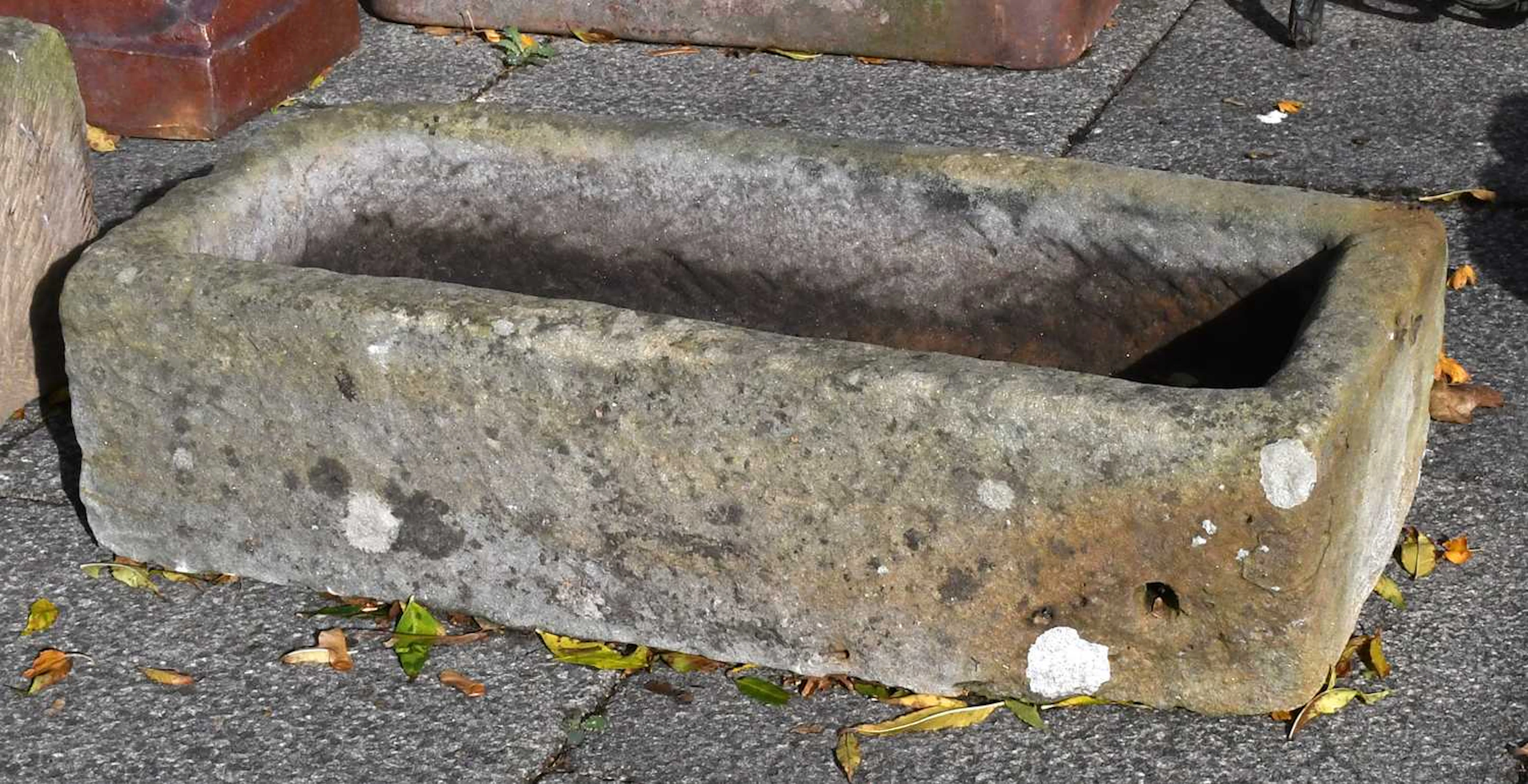 A Rectangular Weathered Stone Trough