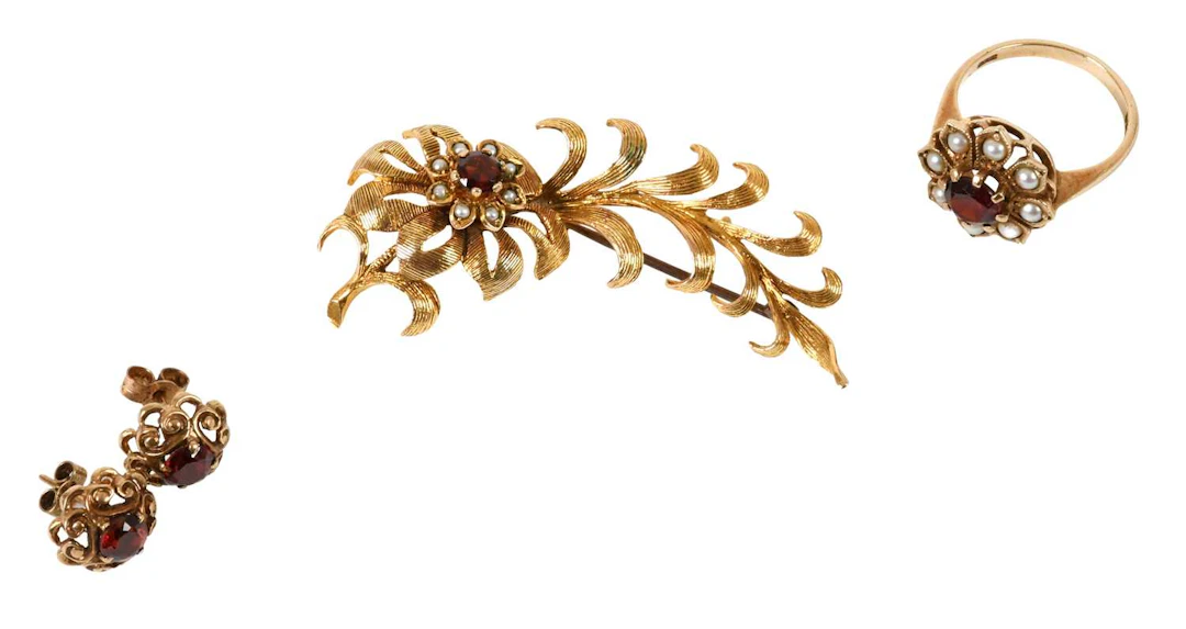A 9 Carat Gold Garnet and Split Pearl Spray Booch, A 9 Carat Gold