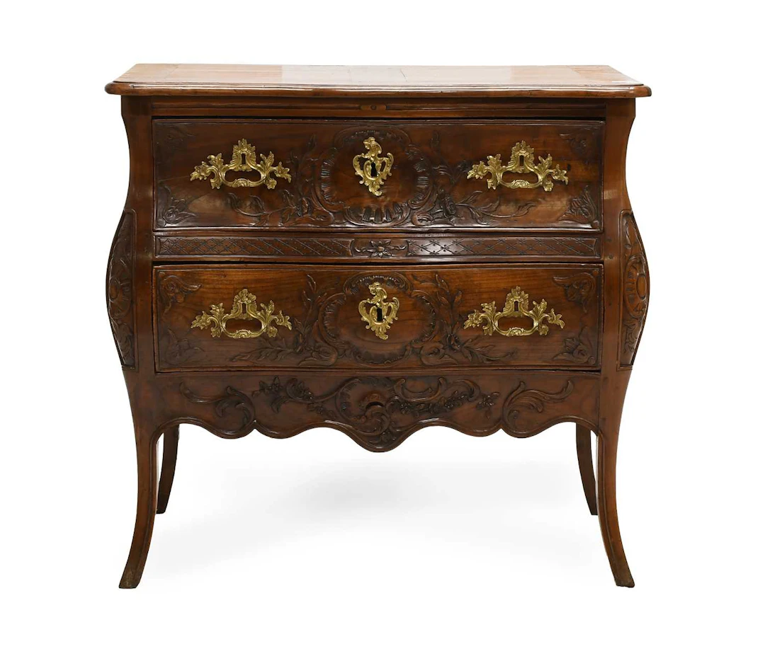 A French Louis XV Provincial Walnut Two-Drawer Commode, mid 18th century