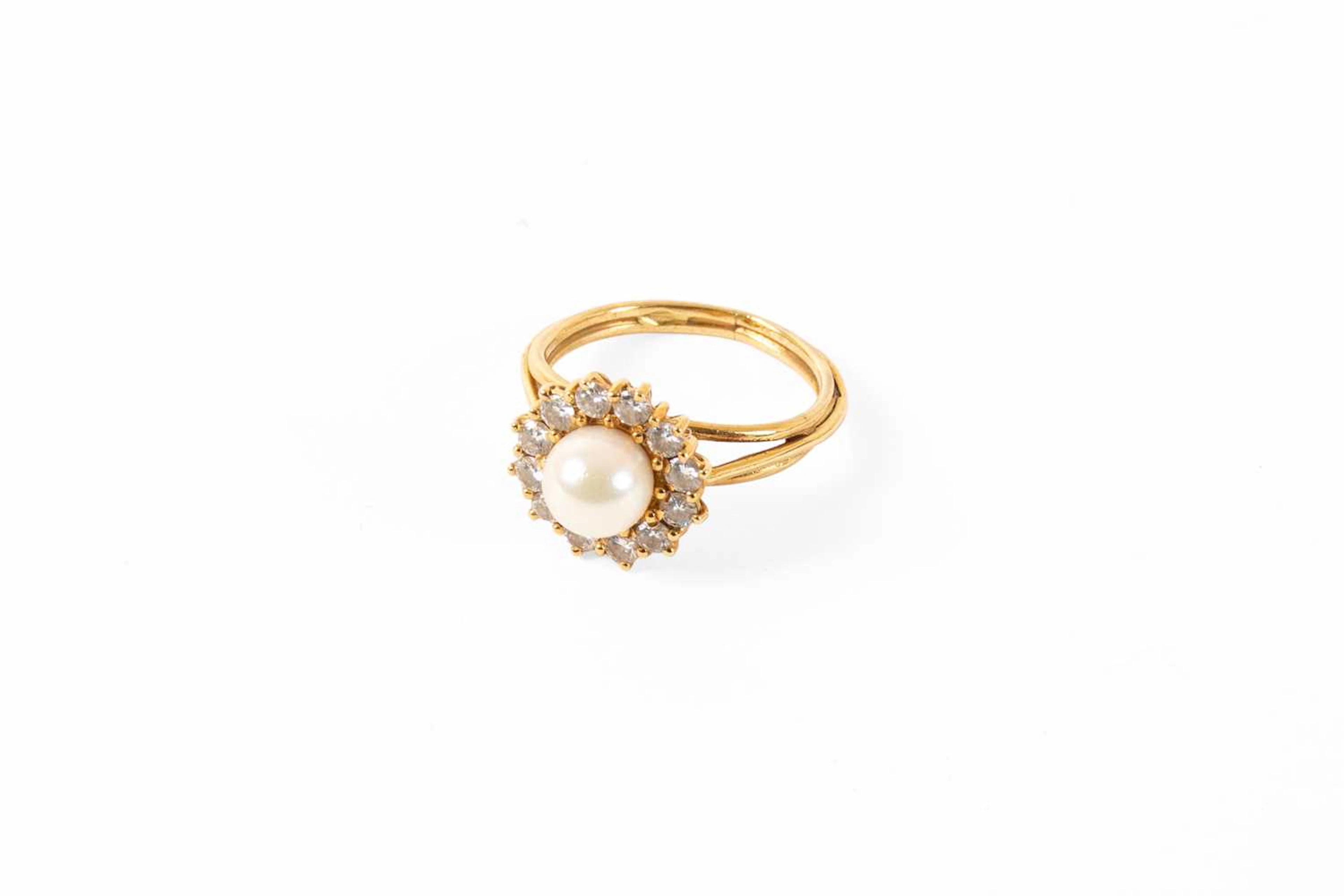 A Cultured Pearl and Diamond Cluster Ring