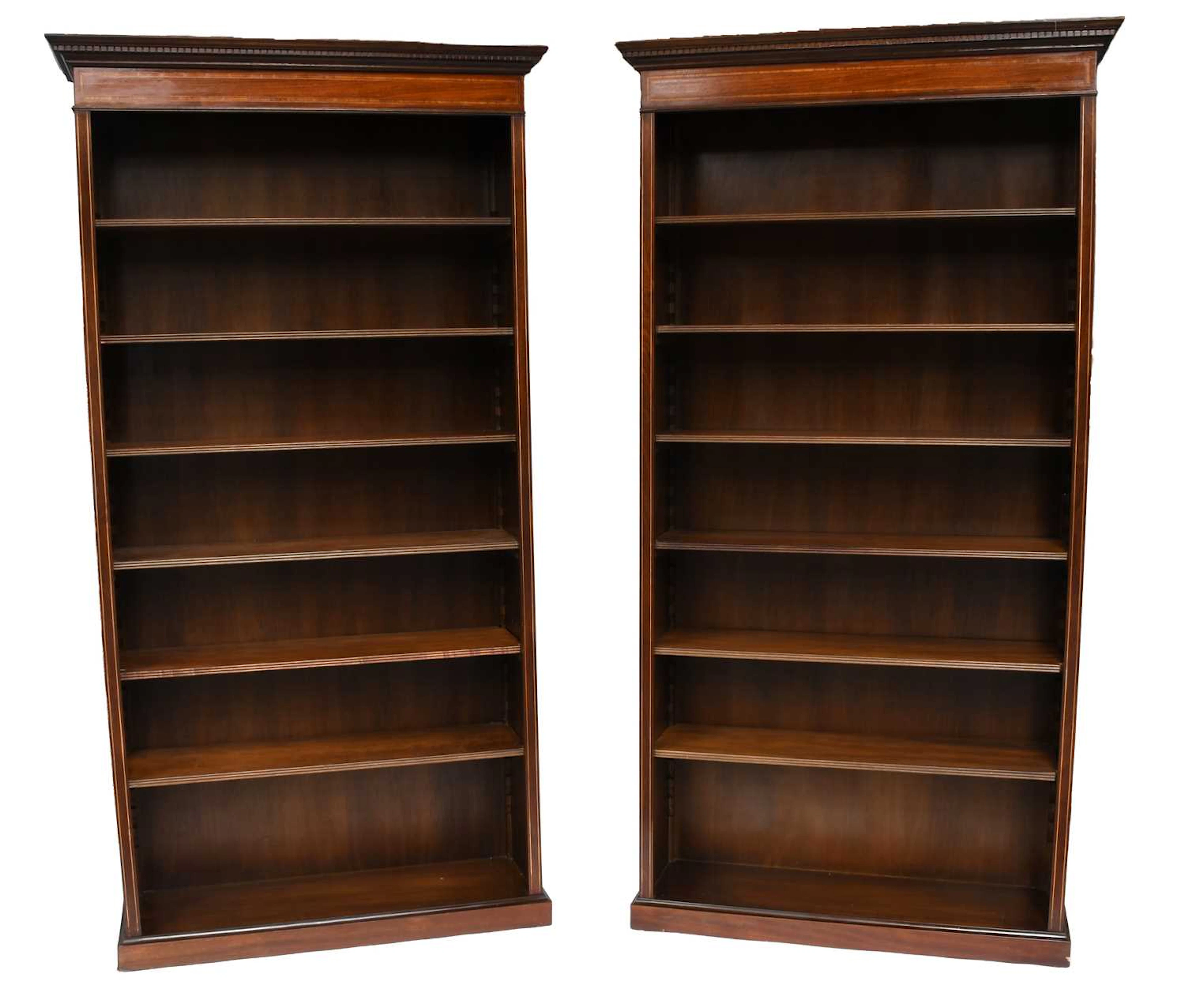 A Pair of Reproduction Inlaid Mahogany Bookcases