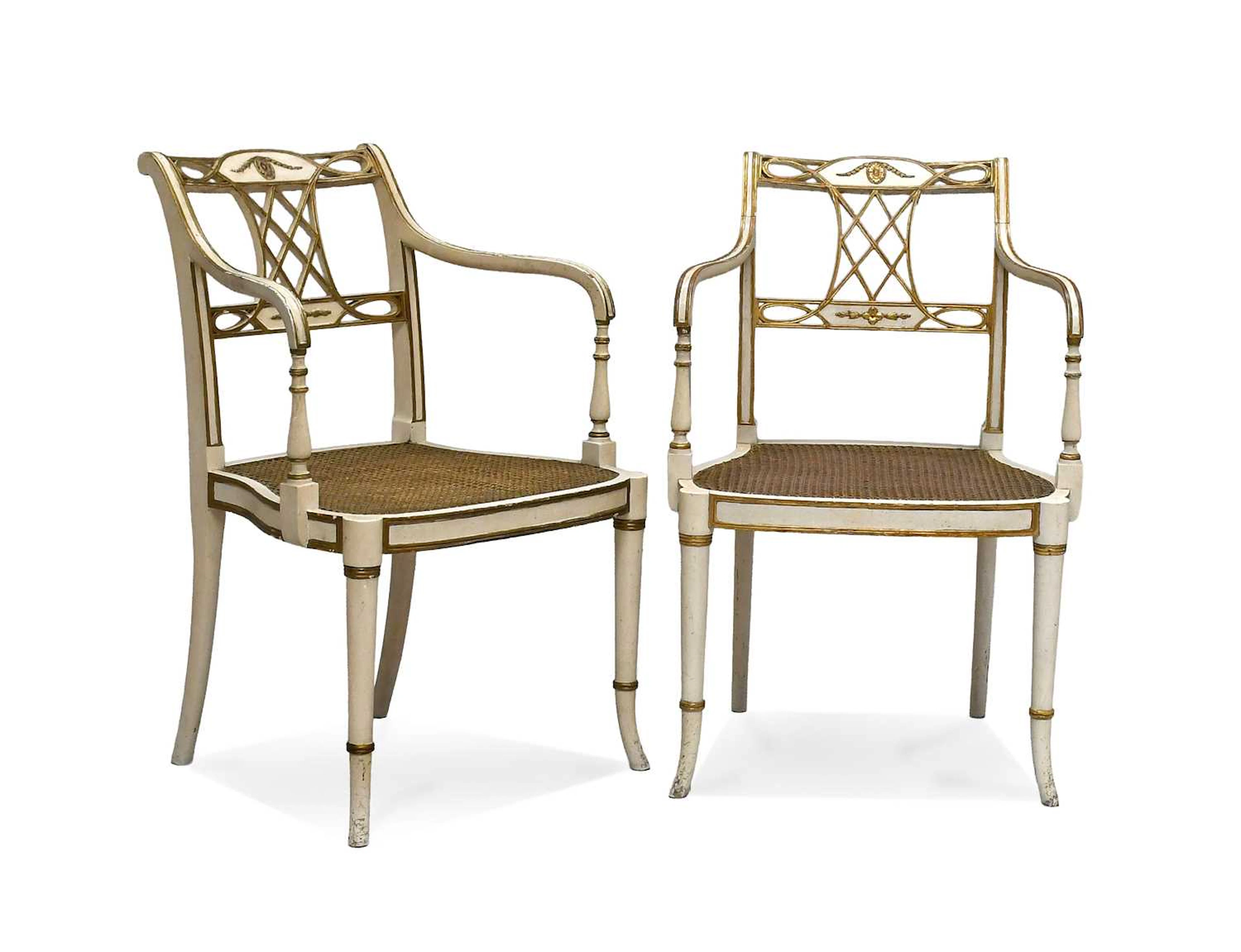 A Pair of Regency-Style Cream-Painted and Parcel-Gilt Armchairs