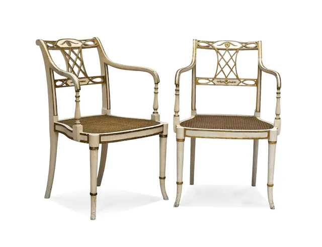 A Pair of Regency-Style Cream-Painted and Parcel-Gilt Armchairs