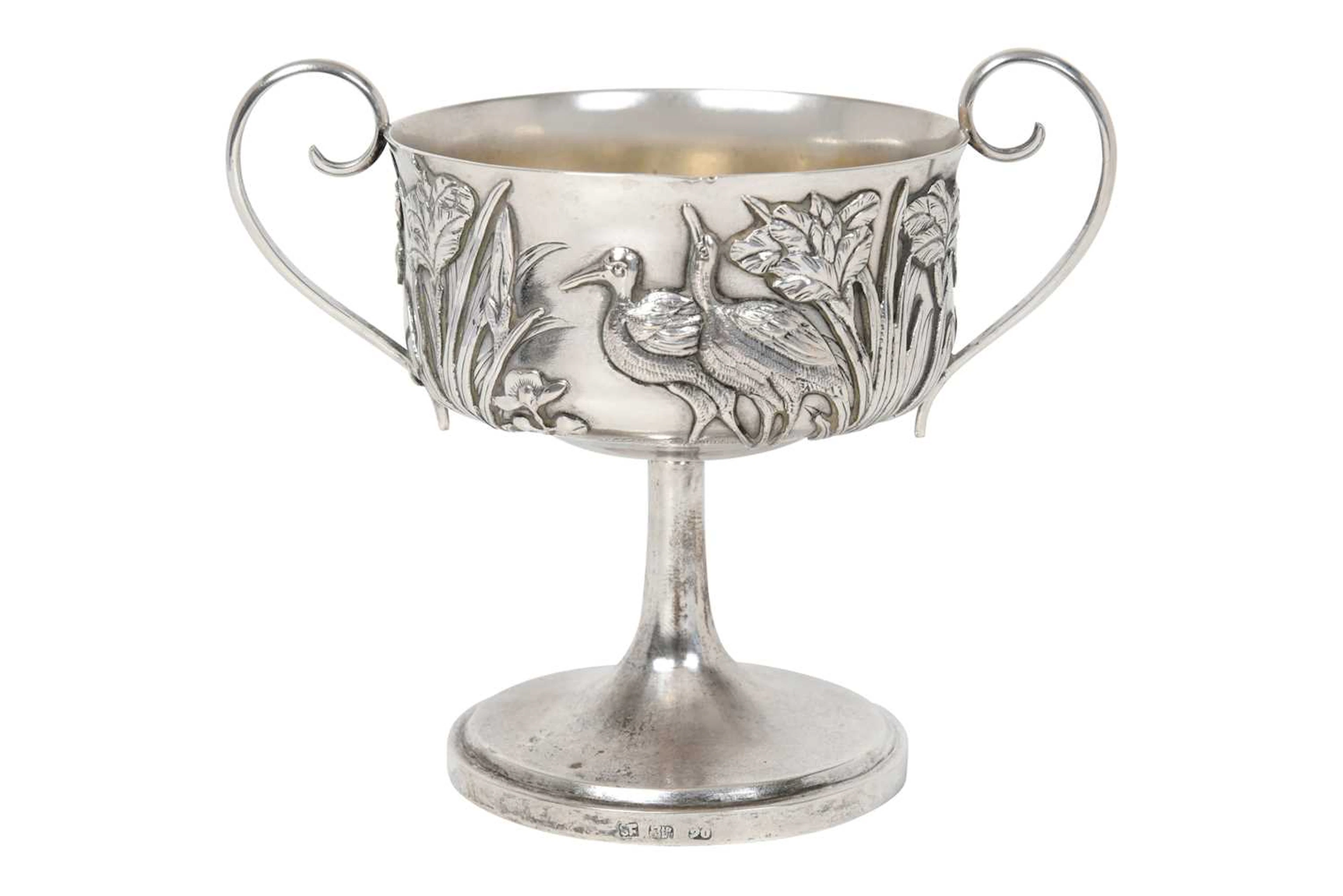 A Chinese Export Silver Two-Handled Cup Retailed by Sing Fat, Canton