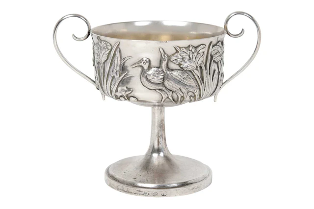 A Chinese Export Silver Two-Handled Cup Retailed by Sing Fat, Canton