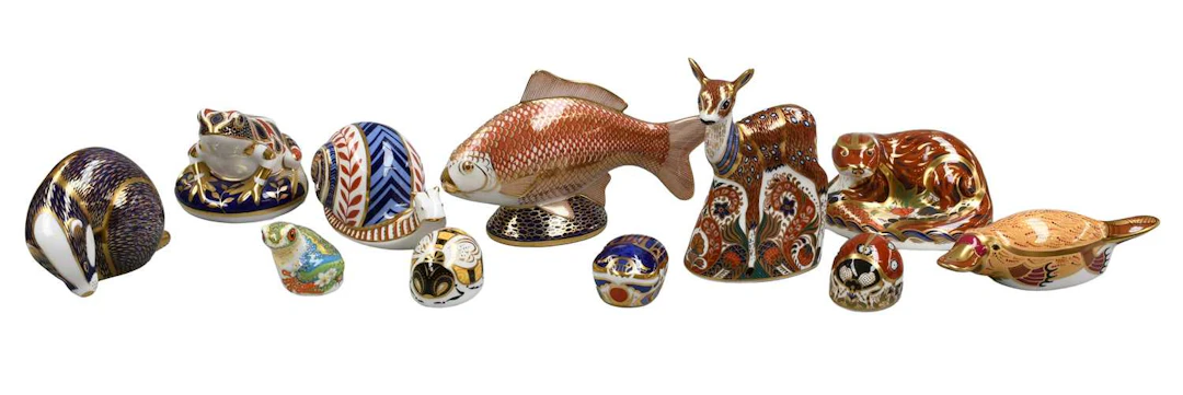 A Collection of Royal Crown Derby Paperweights