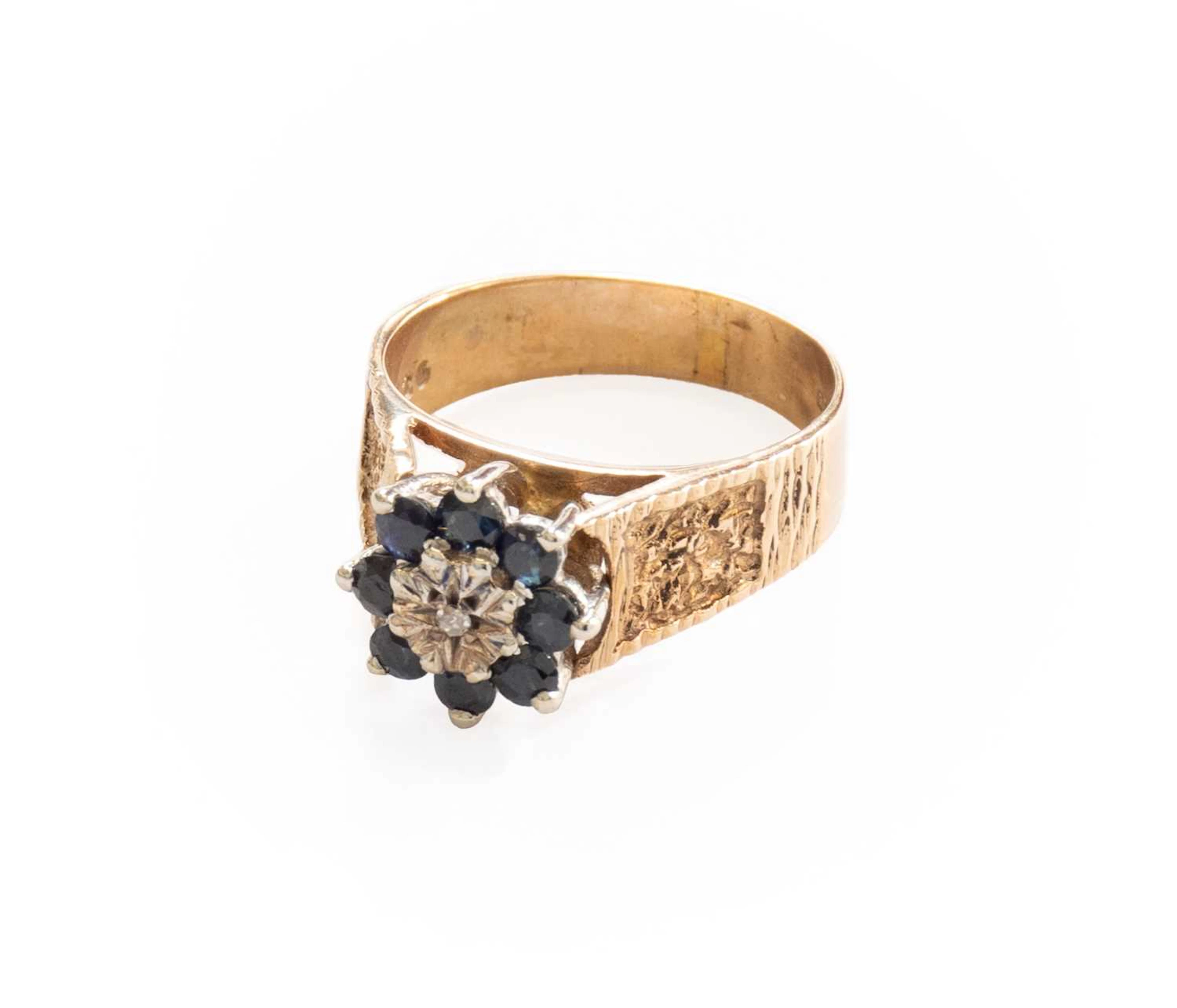 A 9 Carat Gold Sapphire and Diamond Cluster Ring
