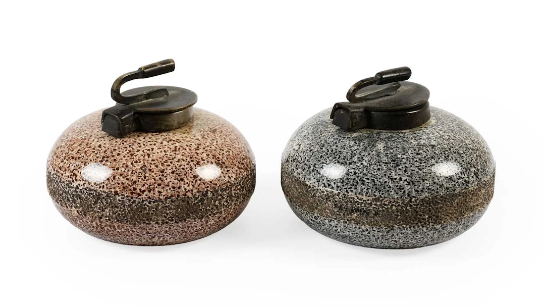A Pair of Earthenware Novelty "Curling Stone" Inkwell Paperweights