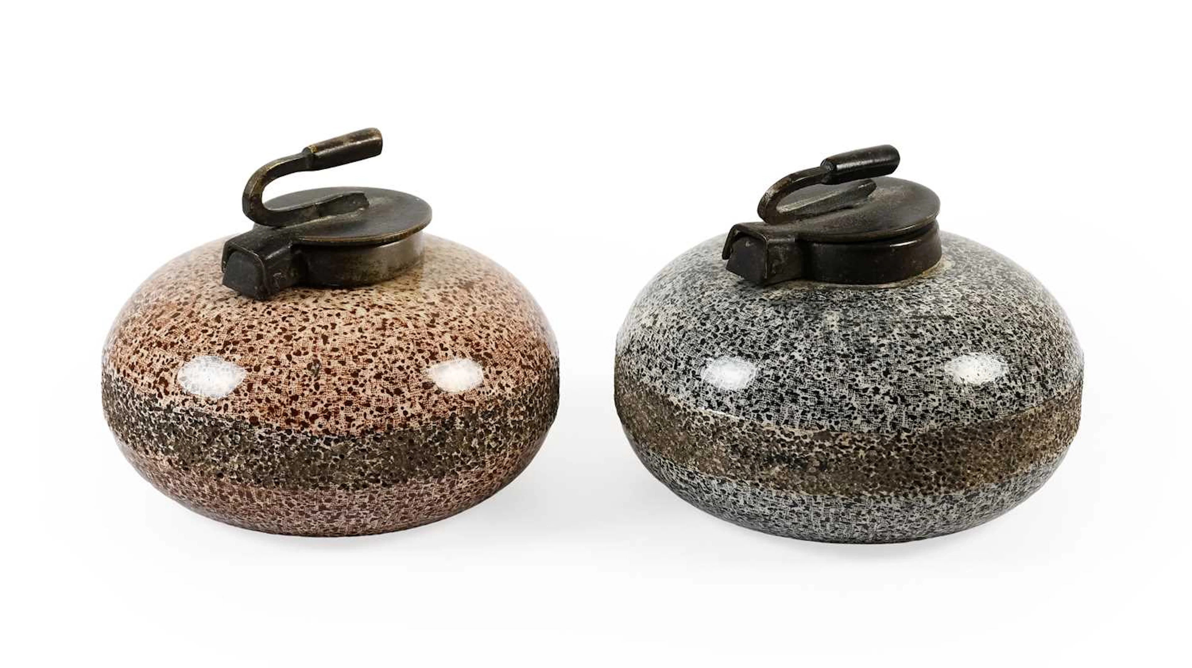 A Pair of Earthenware Novelty "Curling Stone" Inkwell Paperweights